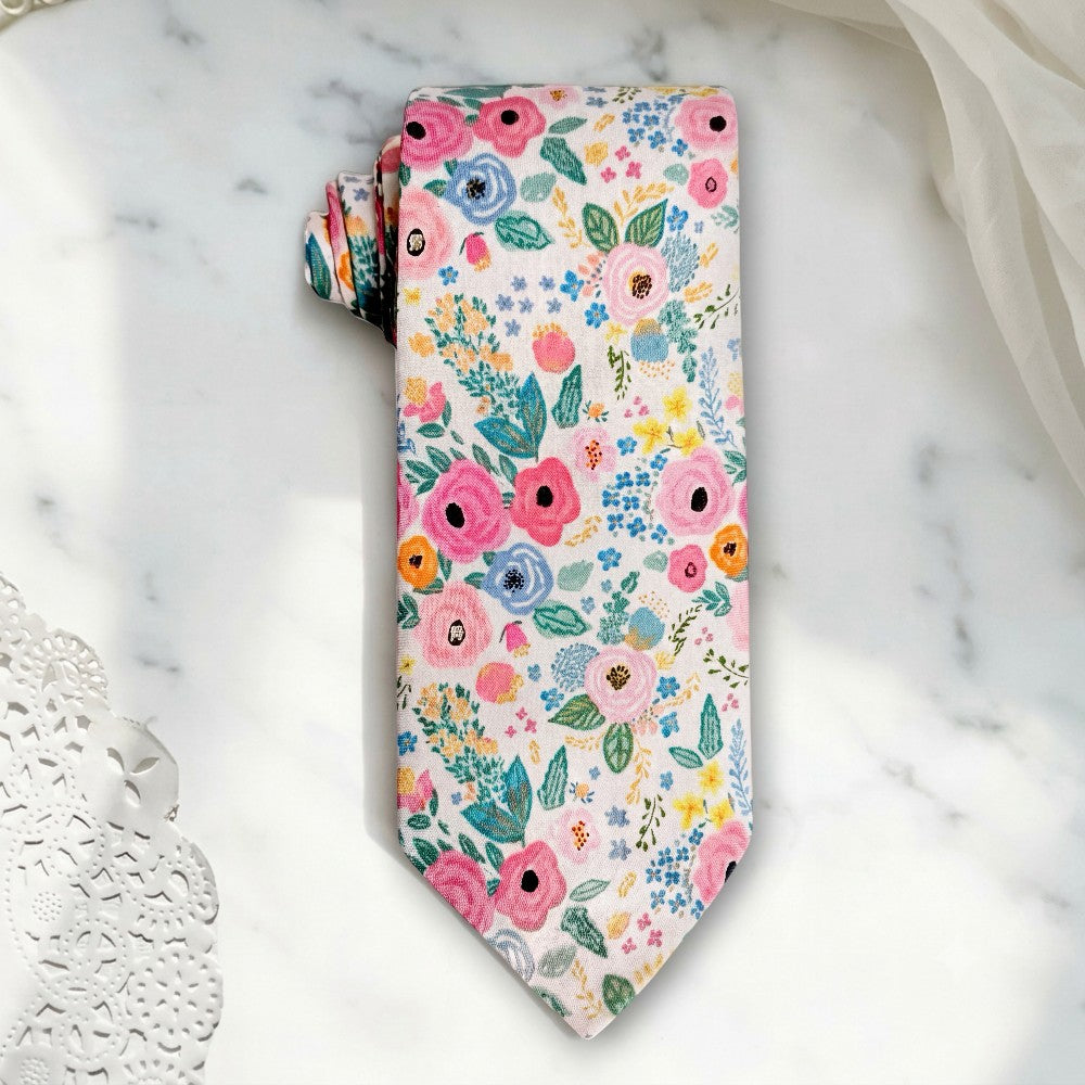 Floral Tie for Men, Groomsmen and Groom in Wedding on a white marble table.