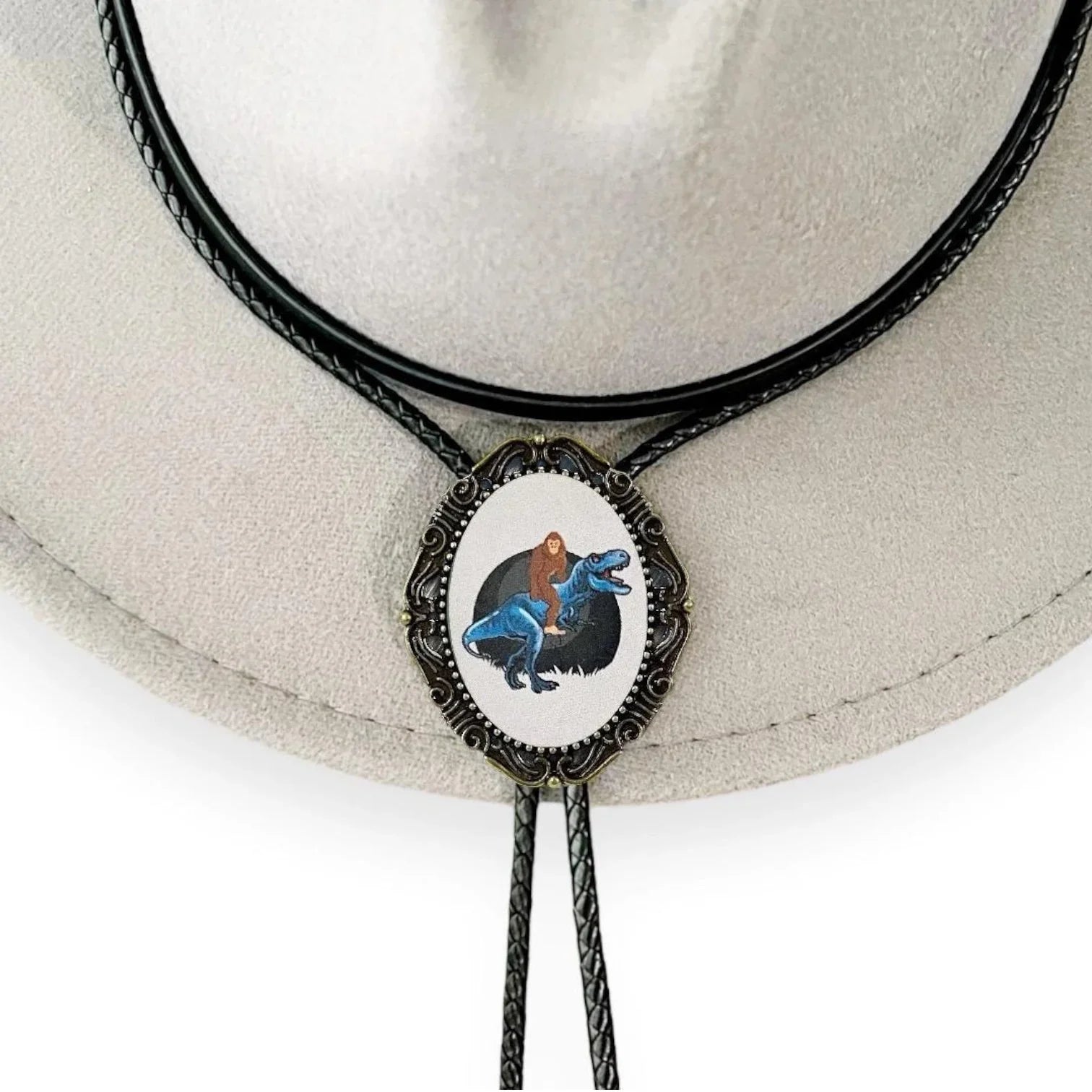 Bigfoot riding a Dinosaur Bolo tie for men groomsmen and wedding.