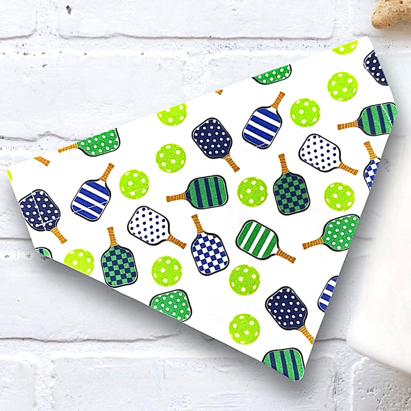 Green and White Pickleball Dog Bandana that slides on to your dog’s existing dog collar.