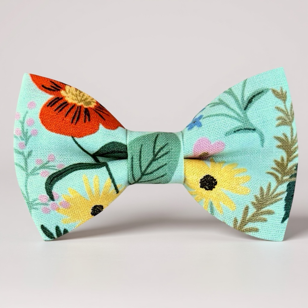 Blue and green floral men’s bow tie for weddings or special occasions.