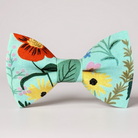 Blue and green floral men’s bow tie for weddings or special occasions.