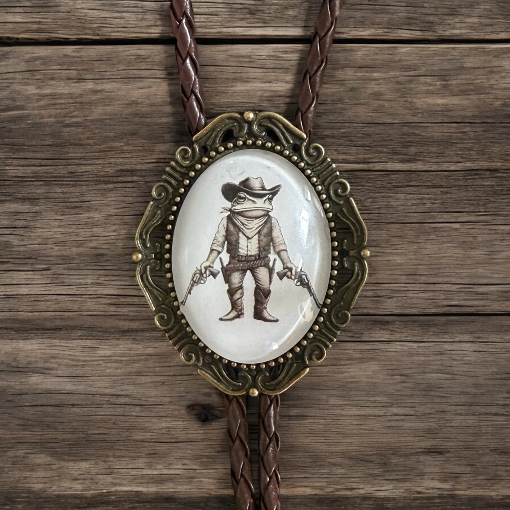 Western bolo tie with glass-coated shooting frog design — unique groomsmen and wedding accessory.