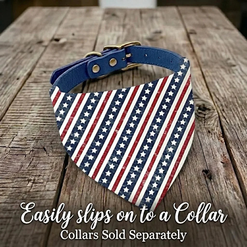 American flag dog bandana on a wooden surface with text indicating it slips onto a collar.