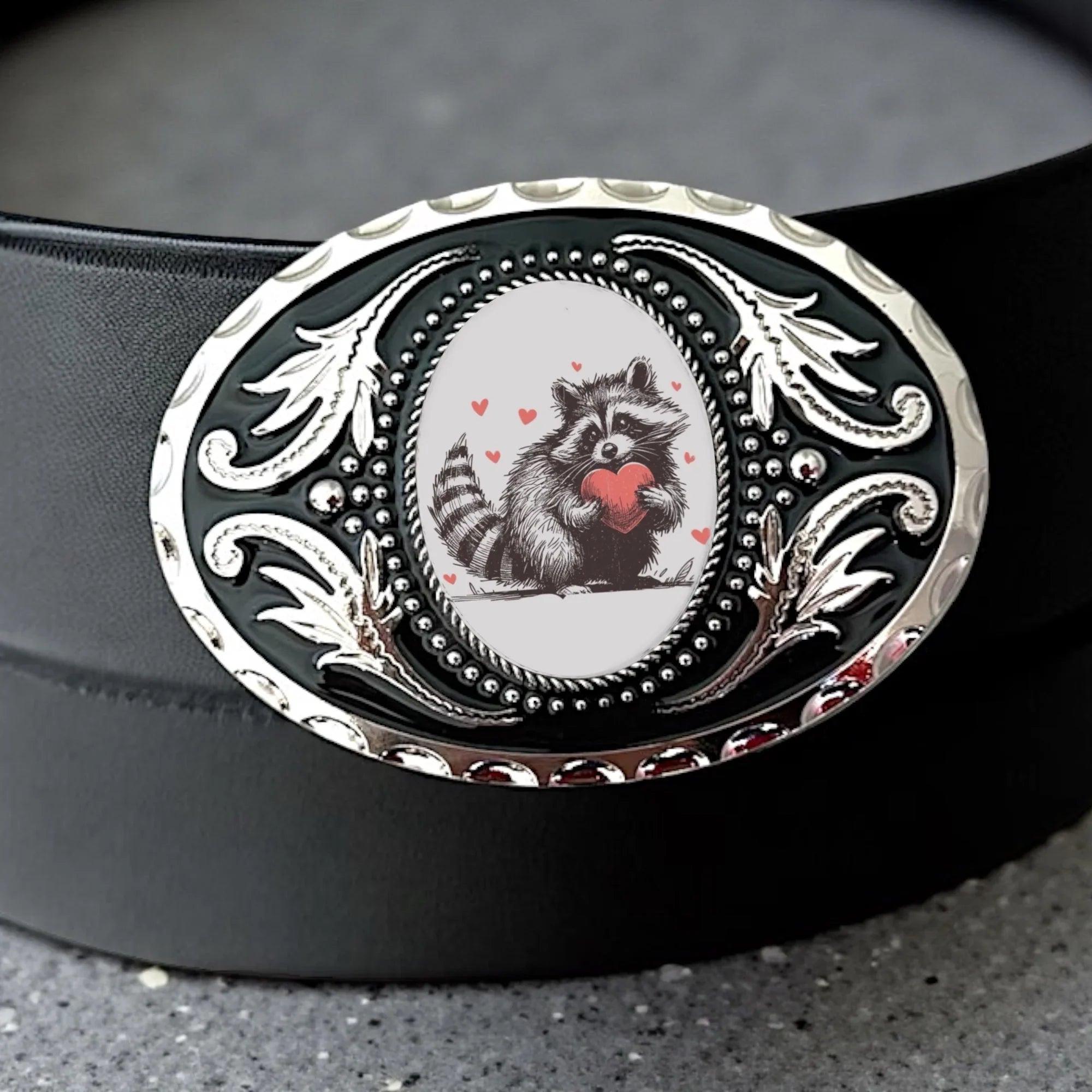 Two options for belt buckles: Option 1 has a leaf pattern and option 2 has flowers on it