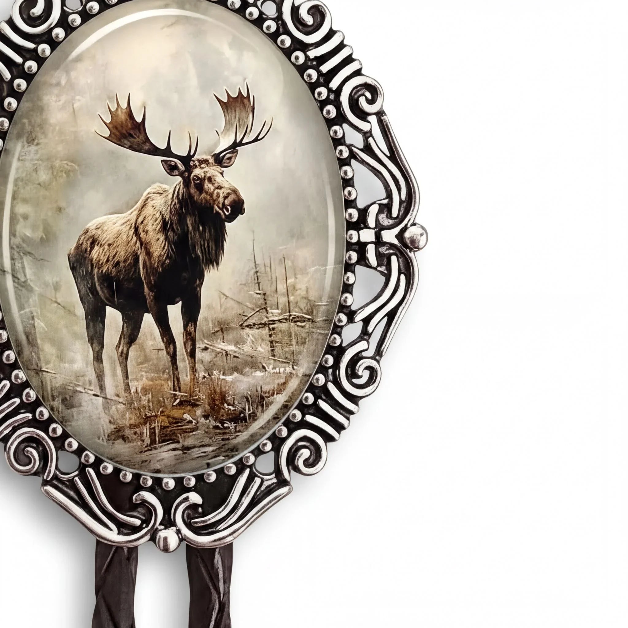 A moose standing in a forest, with a decorative metal frame around it.