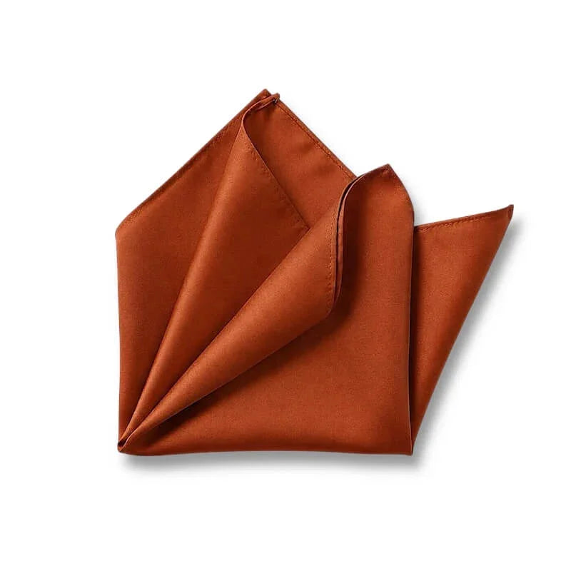 Terracotta pocket square in burnt orange fabric for men, groomsmen and weddings.