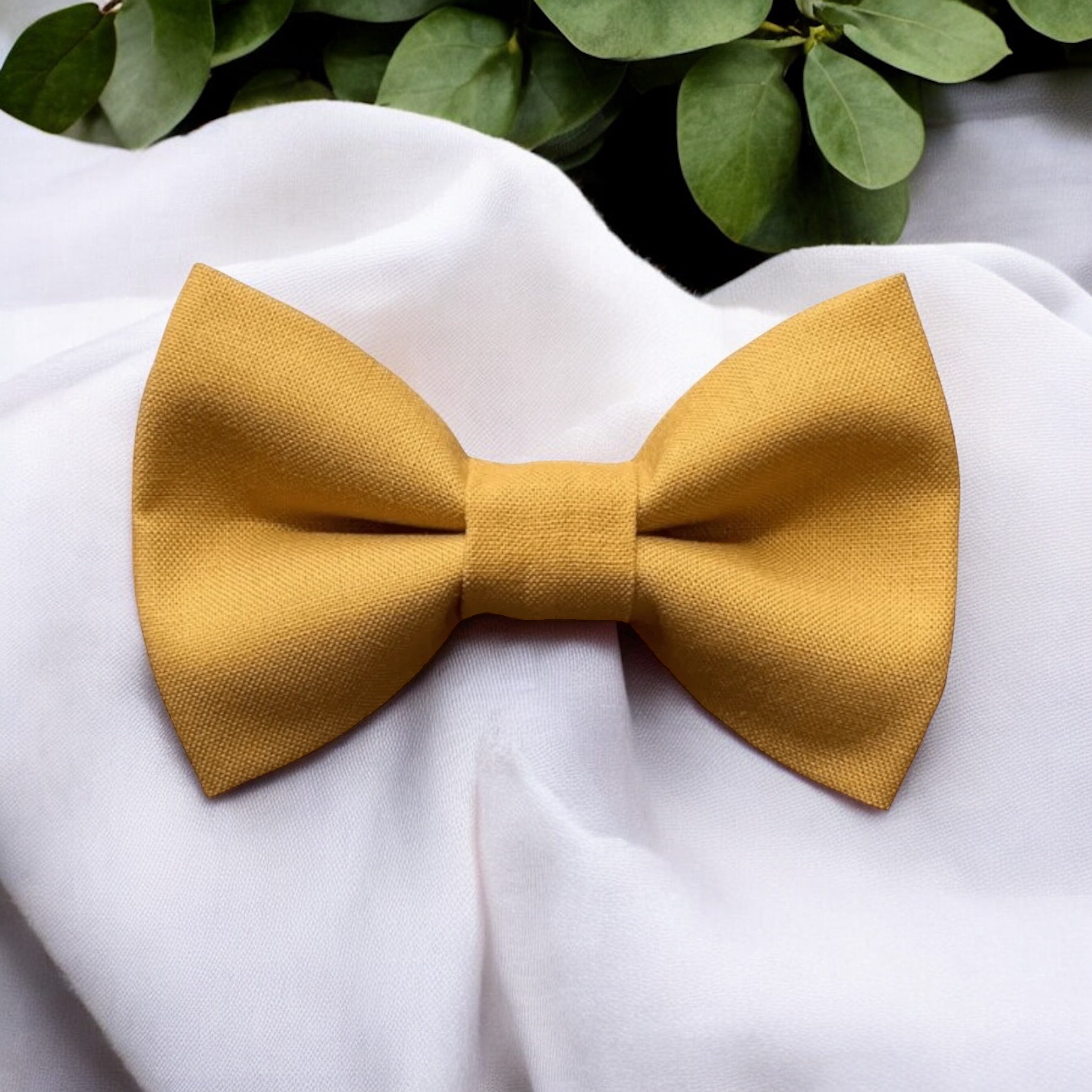 Mustard Yellow Bow Tie for weddings, ring bearers and groomsmen on white overlay.