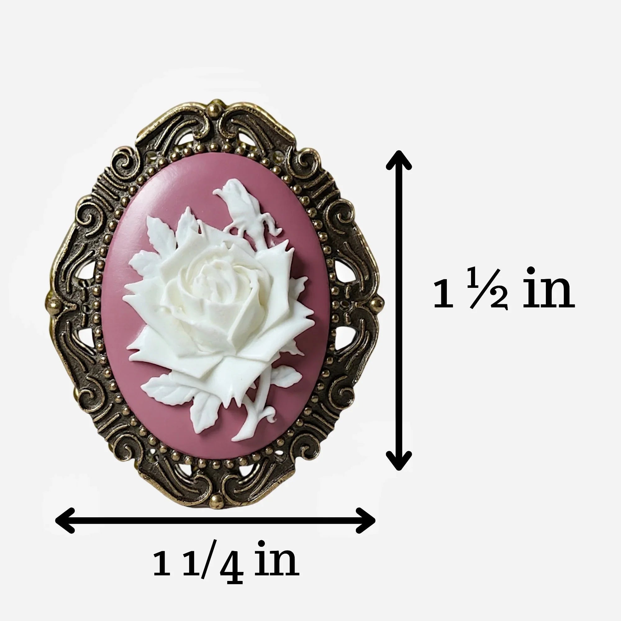 Floral brooch with a white rose design on a pink background, shown with measurements.