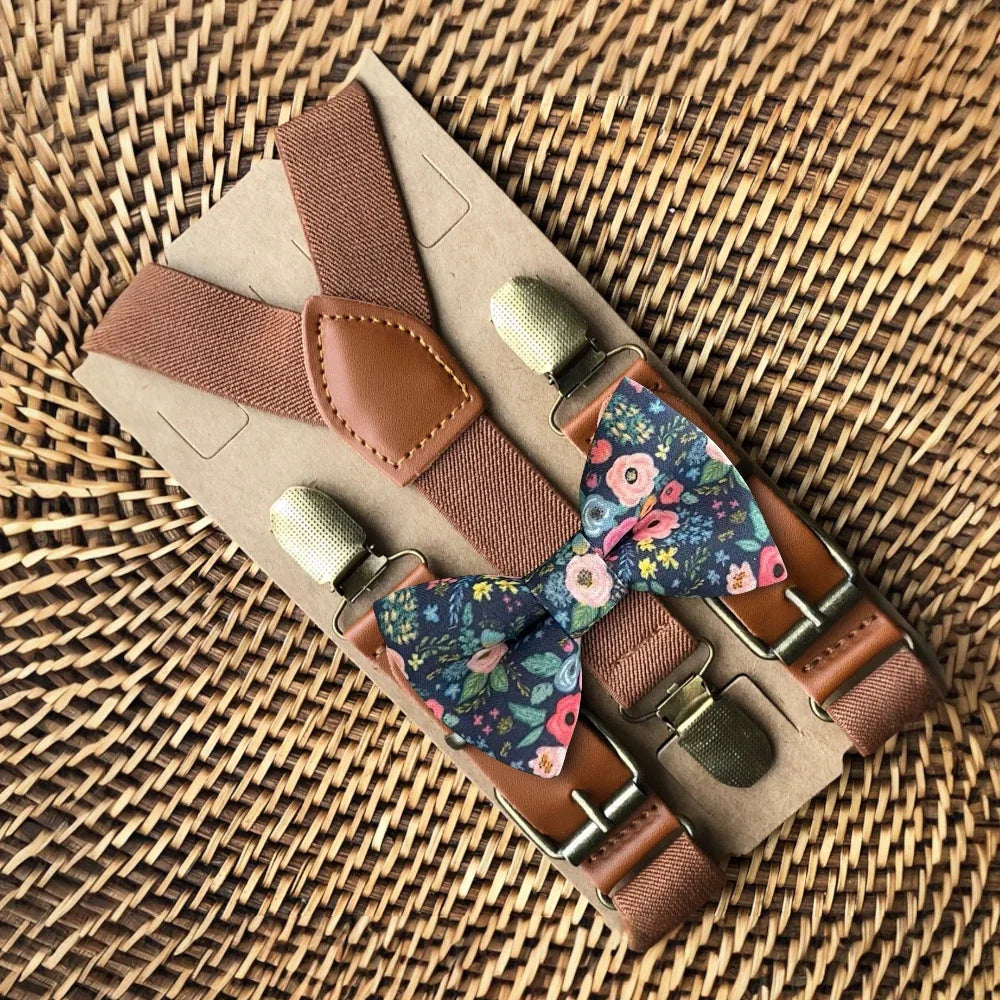 Size chart for suspender and bow tie sets from The Bold Bow Tie. X-Small (6mo-4yr): 15"-23" suspenders, 3.5" bow. Small (5-9yr): 18"-33" suspenders, 3.5" bow. Medium (10-12yr): 18"-33" suspenders, 4" bow. Adult (13yr-6'5"): 30"-53" suspenders, 4.5" bow. Big & Tall (Over 6'5"): 53"+ suspenders, 4.5" bow. Instructions note to measure from the back waistband over the shoulder to the front waistband for a comfortable fit.