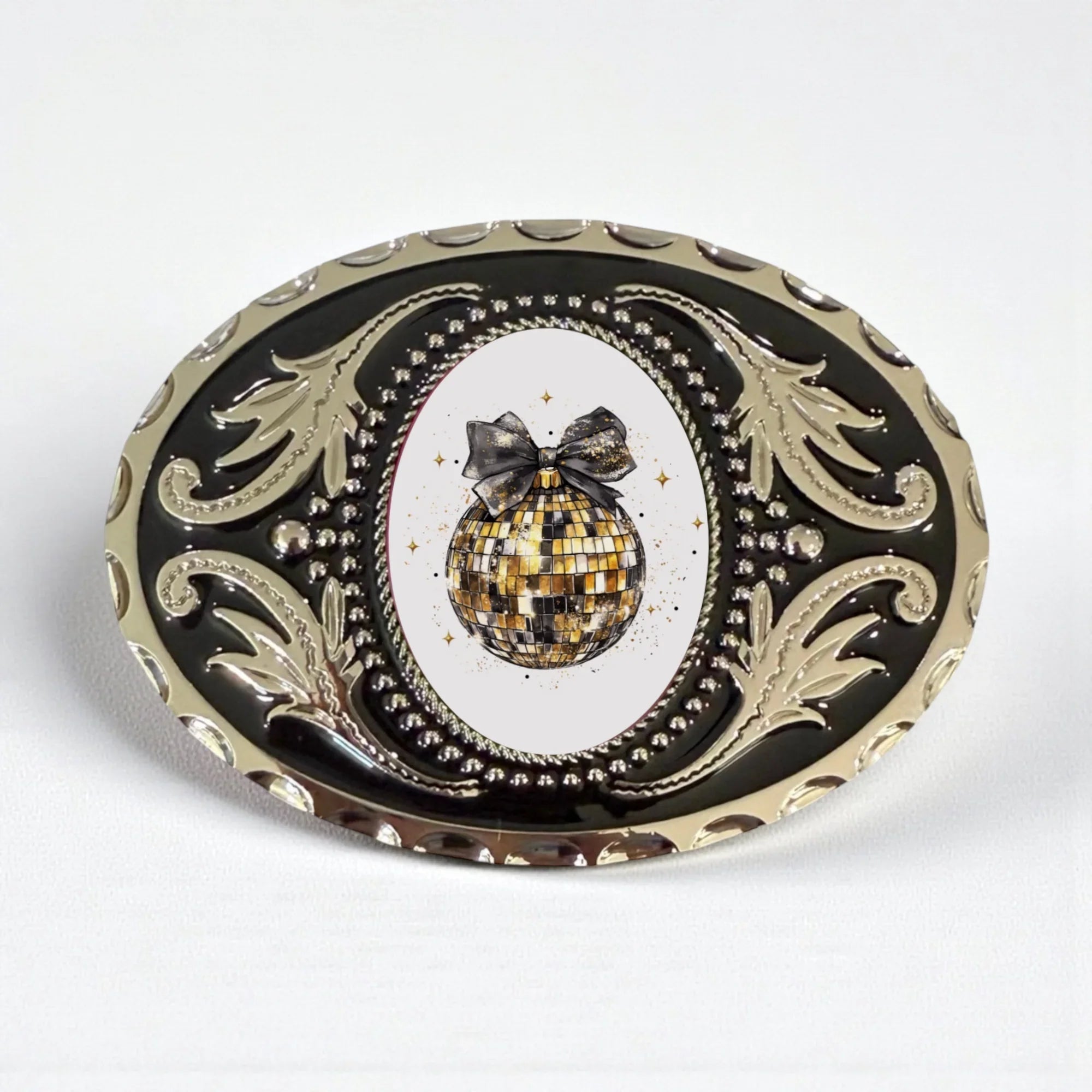 Two options for belt buckles: Option 1 has a leaf pattern and option 2 has flowers on it