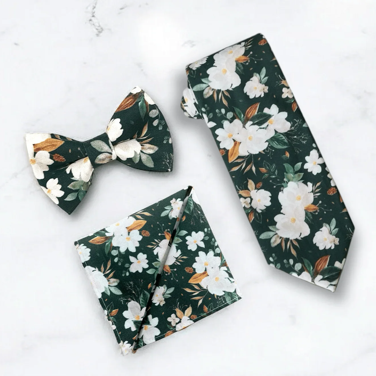 Emerald green floral men’s tie, bow tie and pocket square for wedding or special event.