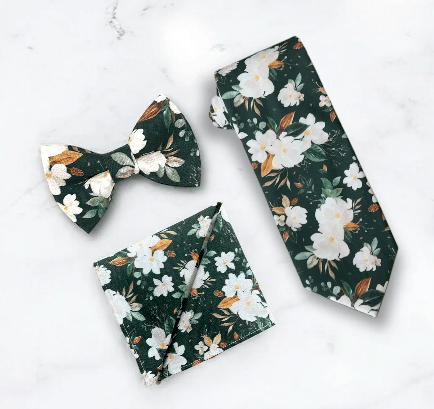 Emerald green floral men’s tie, bow tie and pocket square for wedding or special event.