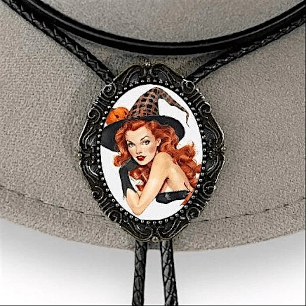 Bolo tie with a witch design on a gray background