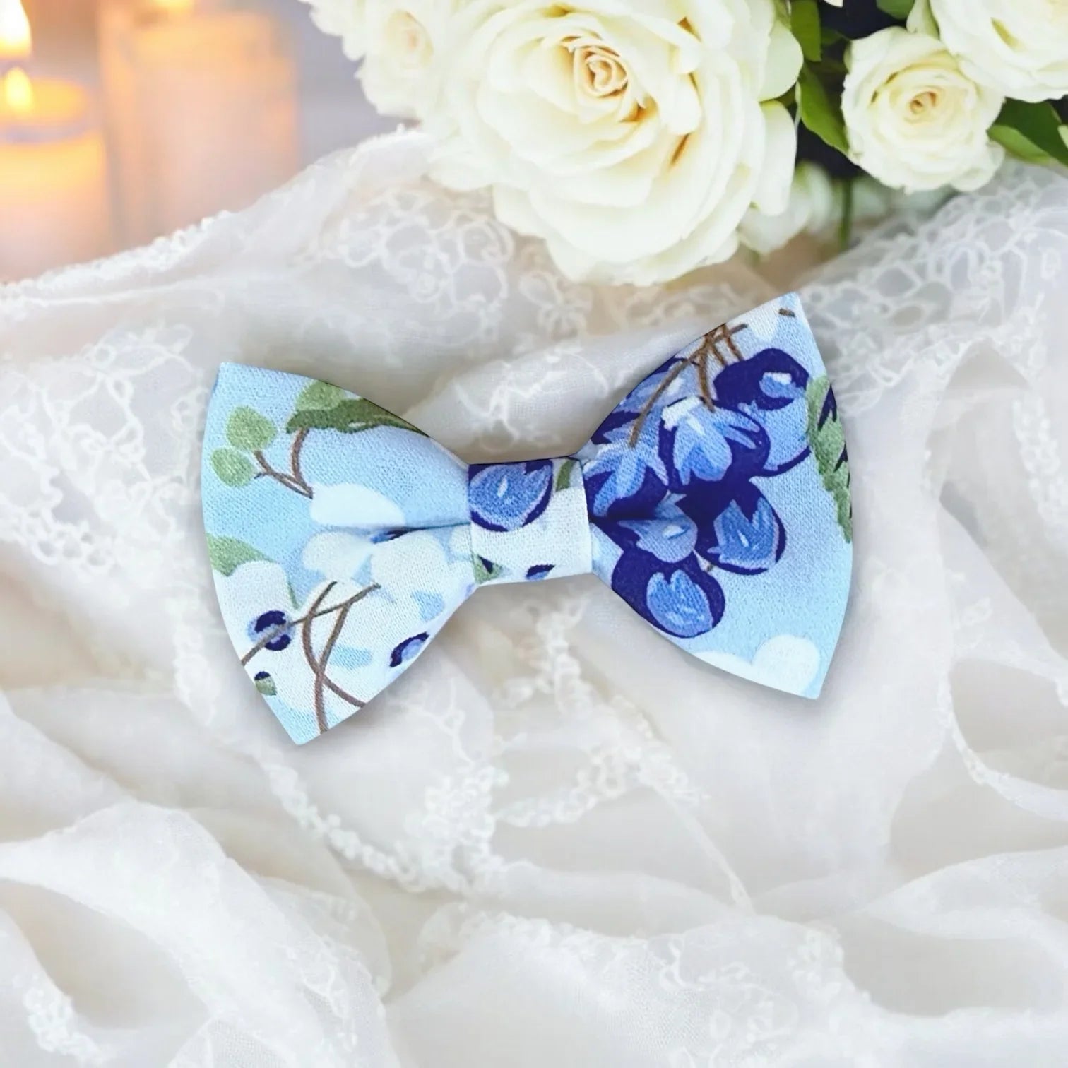 Size chart for pre-tied bow ties from The Bold Bow Tie detailing measurements across three sizes. Small is 3.5 inches wide and recommended for ages 6 months to 5 years. Medium is 4 inches wide and recommended for ages 6 to 12 years. Large is 4.5 inches wide and recommended for ages 13 years and up. Visual icons illustrate the relative sizes with horizontal arrows showing that width is measured from wingtip to wingtip. Bottom text notes that all bow ties are pre-tied and ready to add to your outfit.