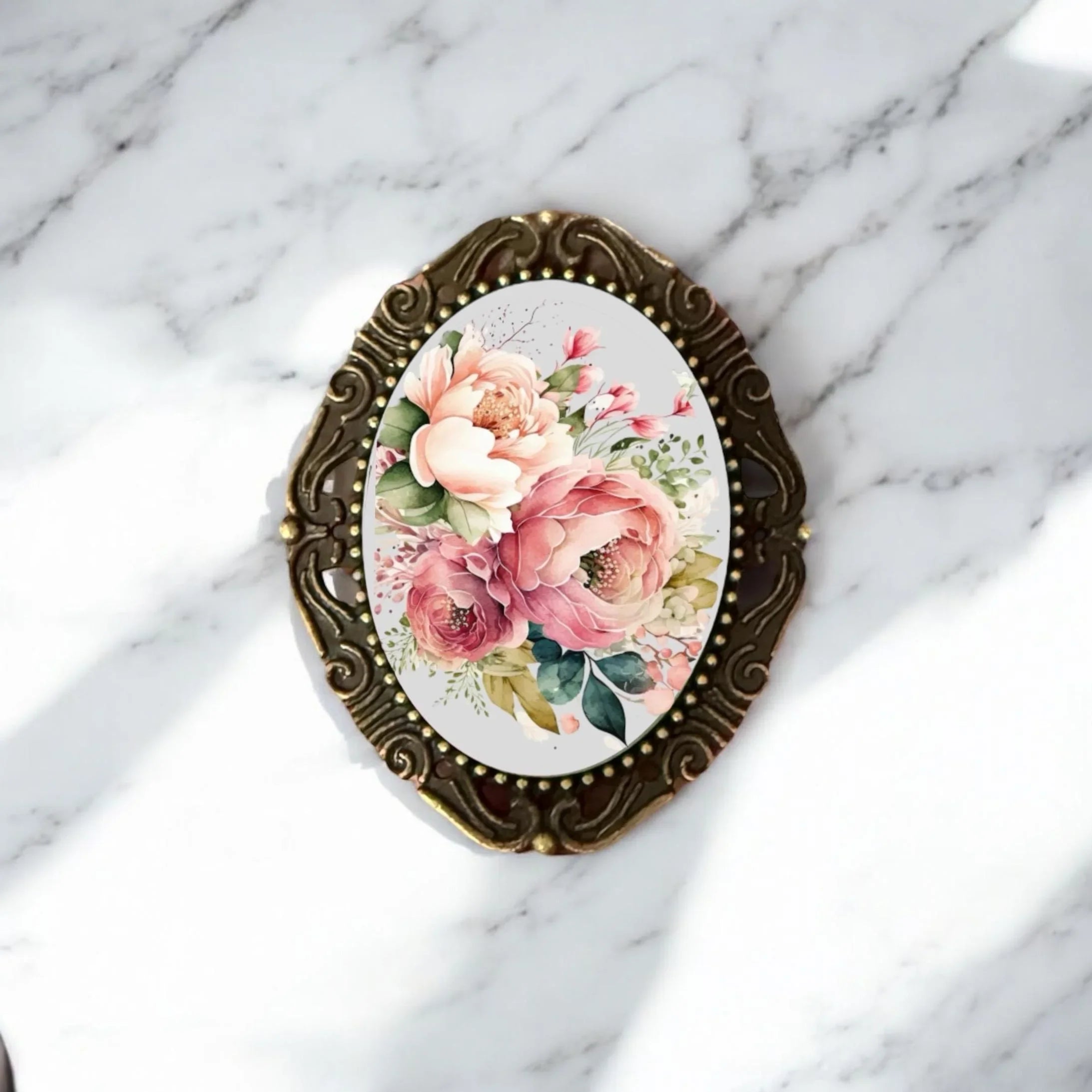 Bronze victorian style floral brooch for her, Mother's Day gift, or birthday gift on a white background.