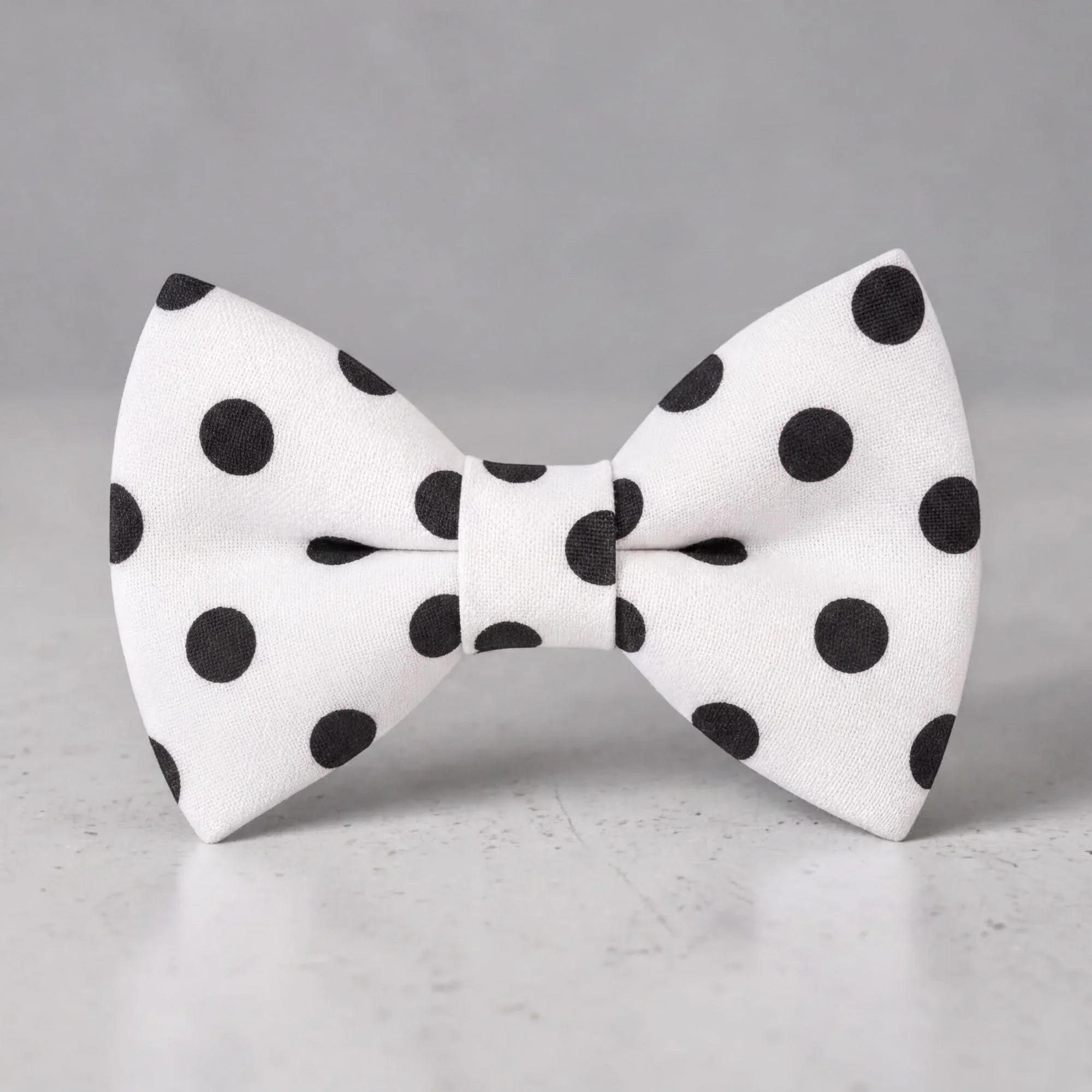 Black and white polkadot bow tie for men boys and toddlers.