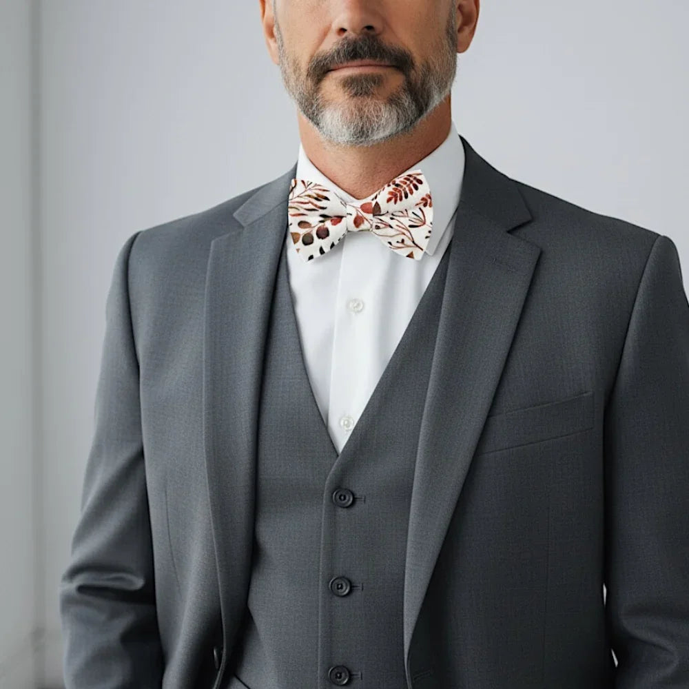 Terracotta floral bowtie for men, groomsmen and ring bearers.