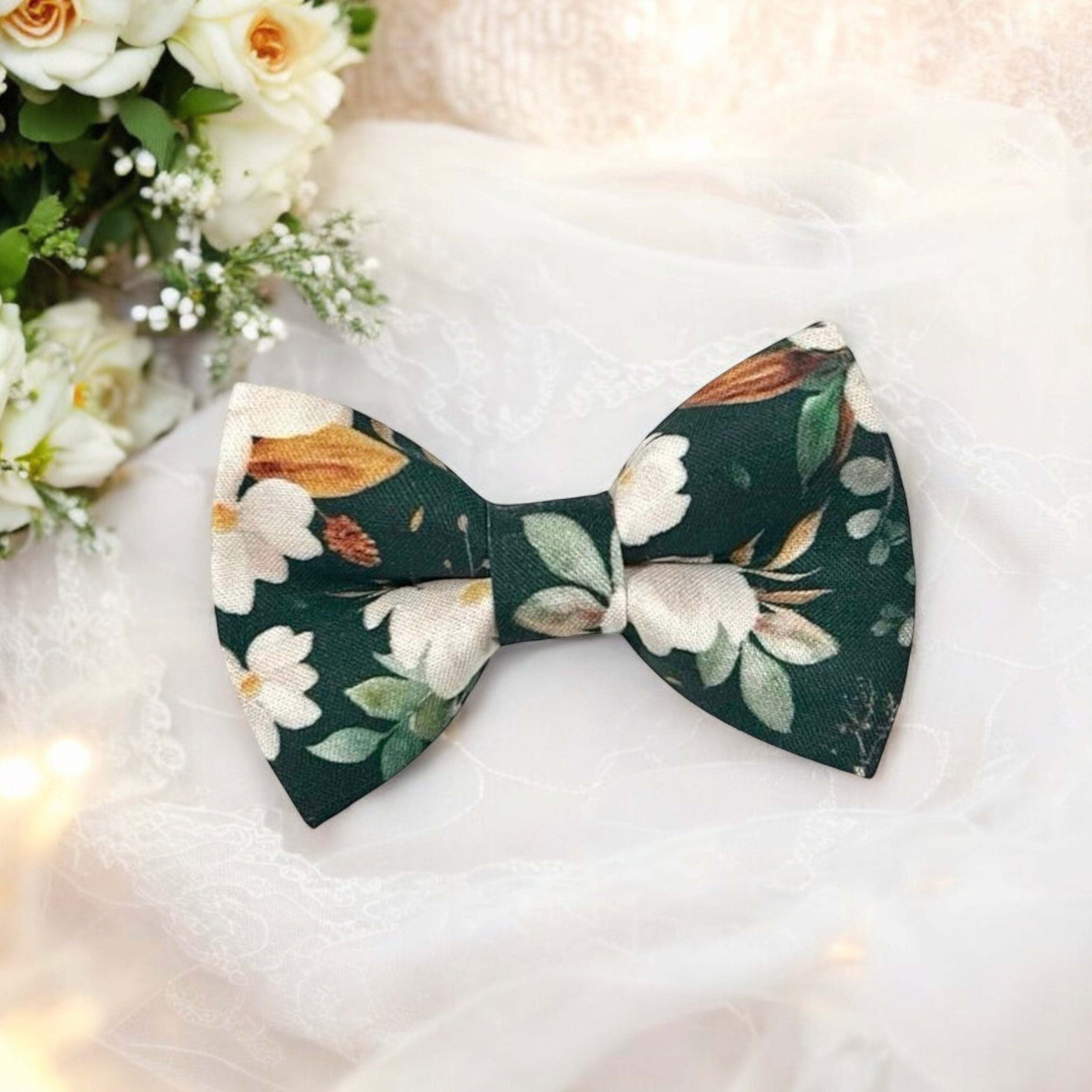 Emerald green floral bow tie for groomsmen, groom at a wedding, and ring bearers.