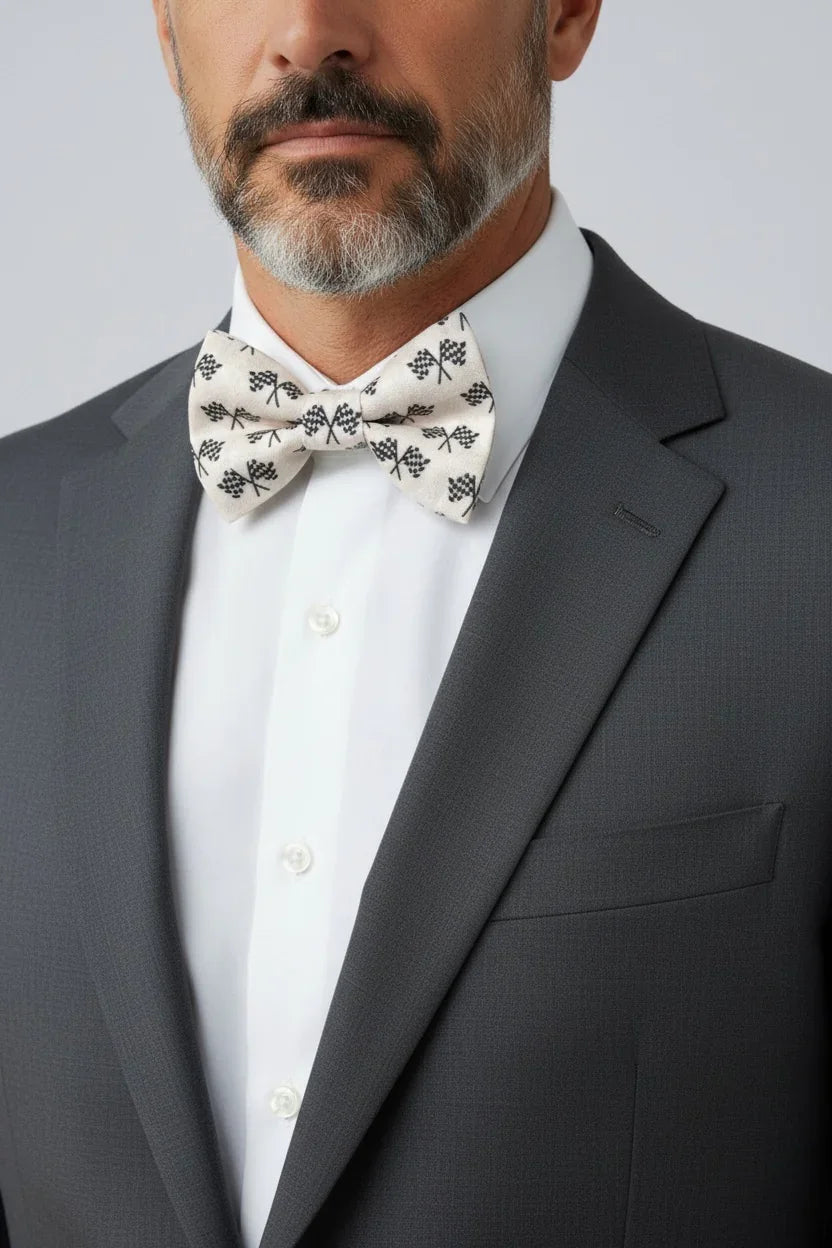 Racing Flag bowtie for men on a gentleman in a gray suit.
