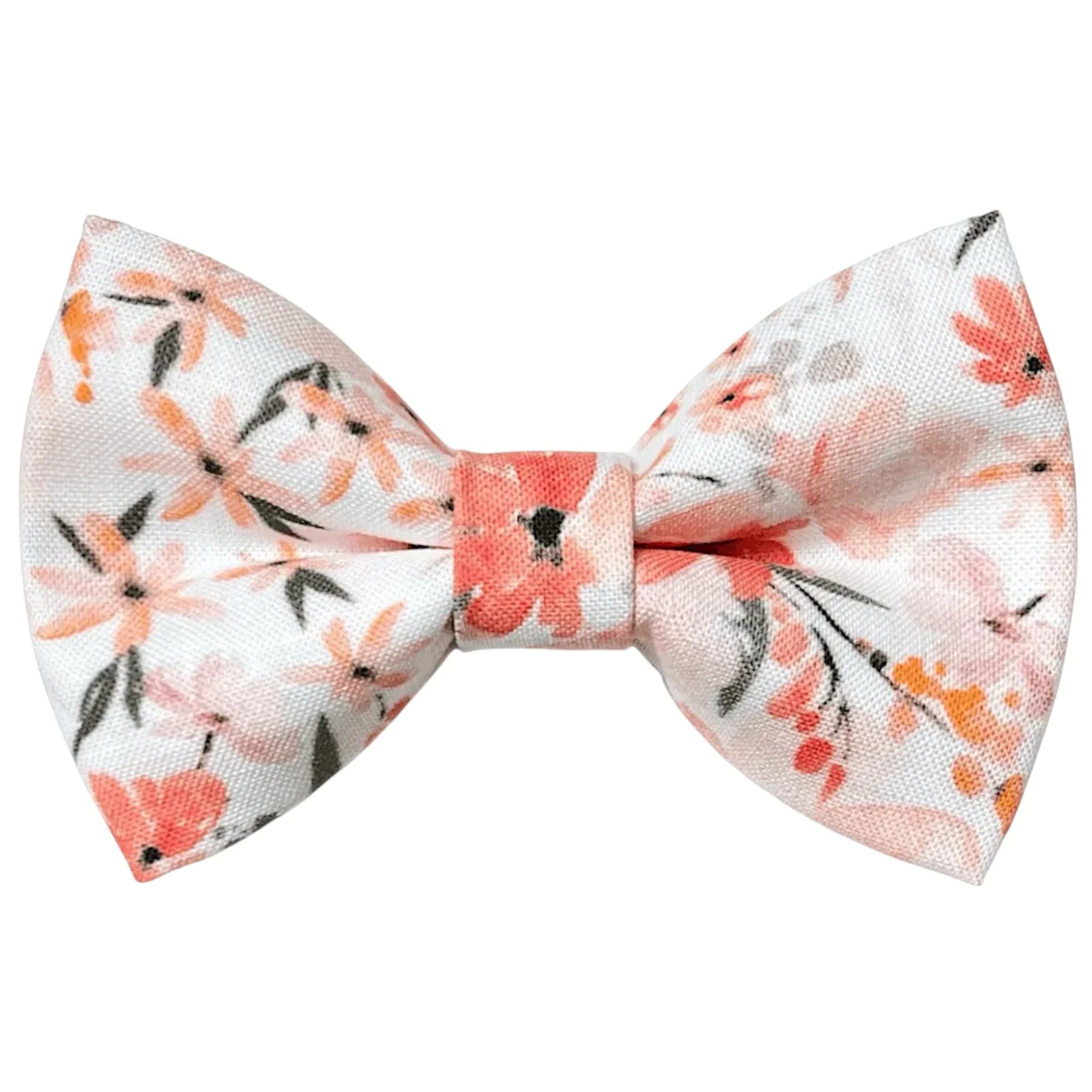 Peach floral bow tie with pink and orange flowers on light fabric.