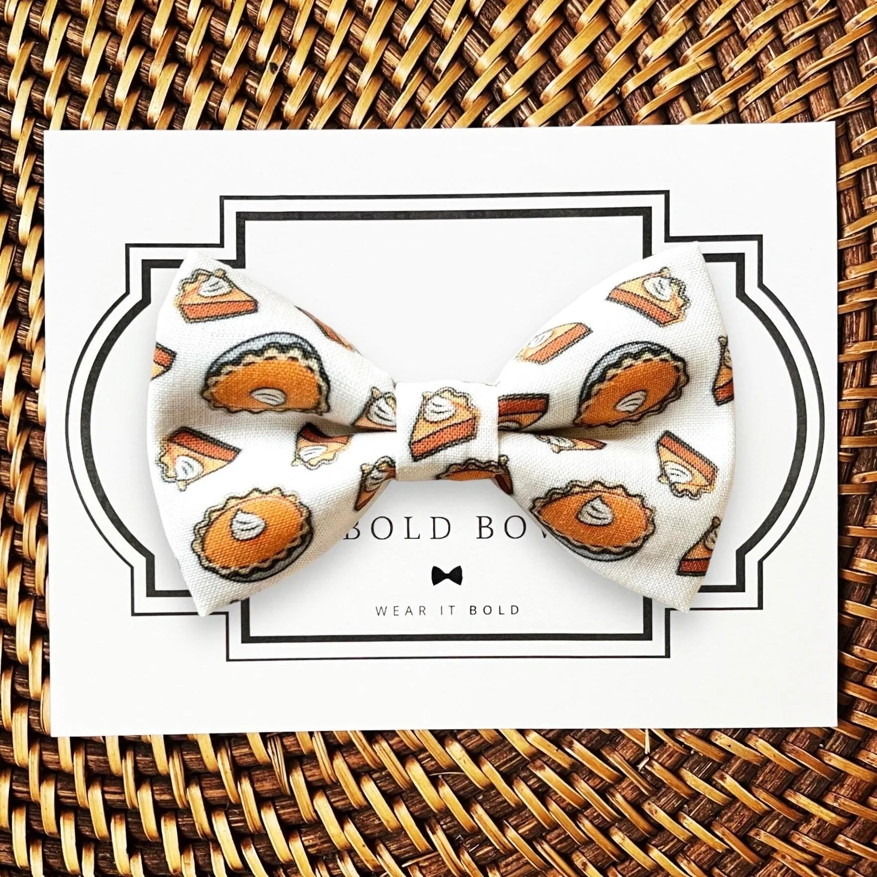 Pumpkin Pie Bow Tie for dog or cat collar displayed on a decorative card with a white background