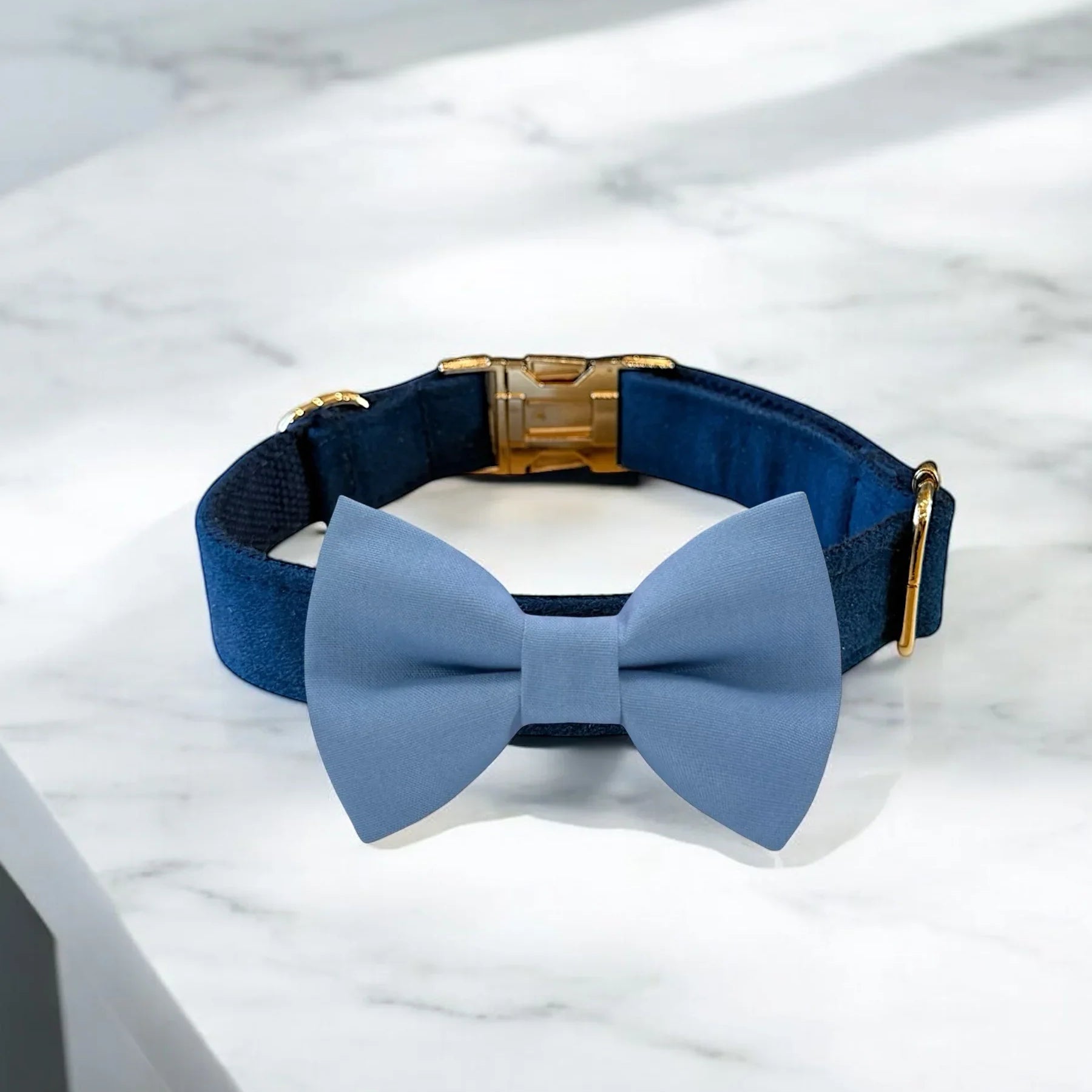 Dog bow tie size chart. Size Small is 3 1/2 inches wide for small dogs under 15 lbs. Size Medium is 4 inches wide for medium dogs between 15 band 40 lbs. Size Large is 4 1/2 inches wide for Large Dogs between 40 band 80 lbs. Size Extra Large is 5 1/2 inches wide for Extra Large Dogs over 80 lbs. Sizing is up to preference and pet bow ties slide on to dog collars with elastic.