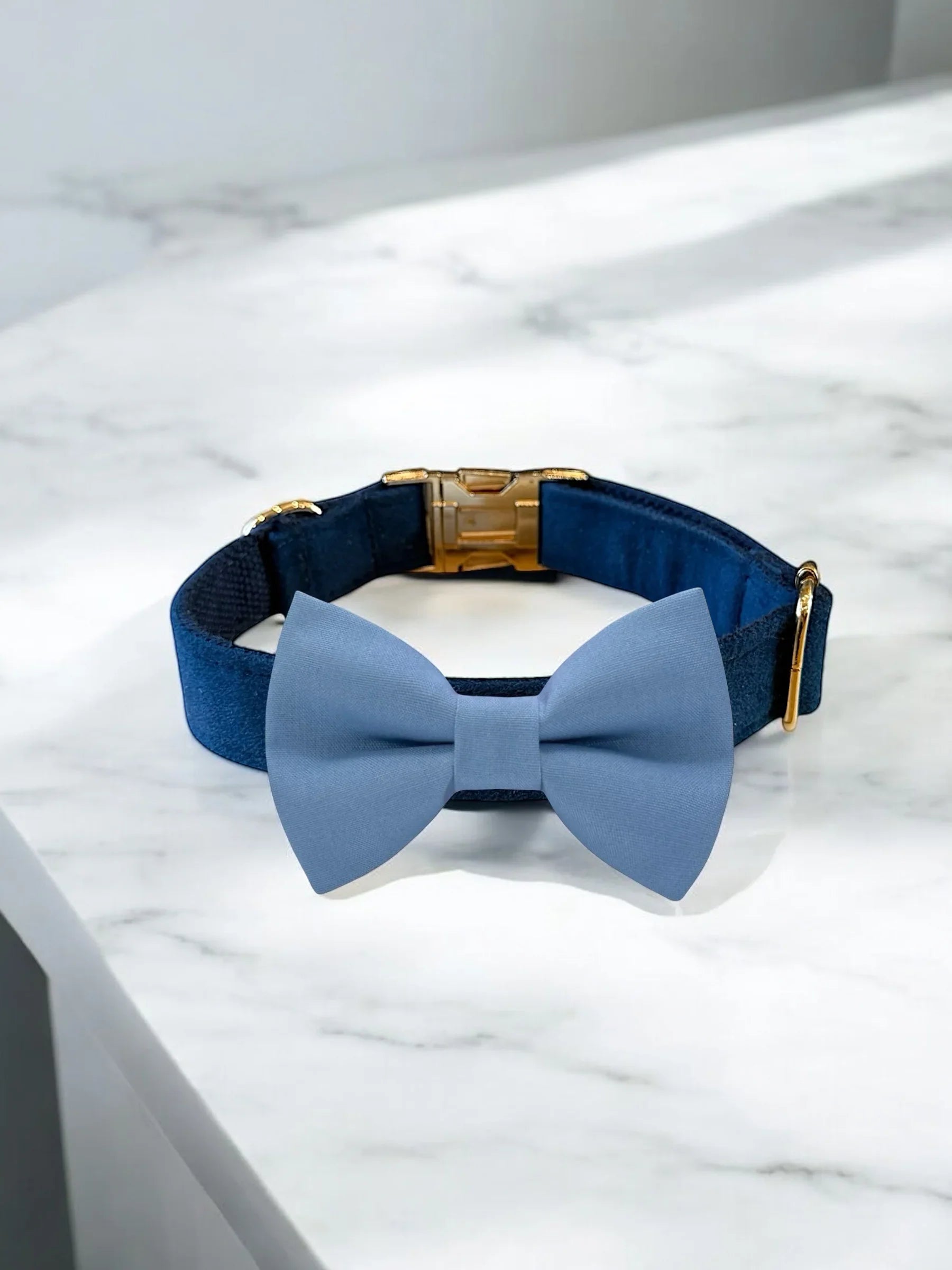 Dog bow tie size chart. Size Small is 3 1/2 inches wide for small dogs under 15 lbs. Size Medium is 4 inches wide for medium dogs between 15 band 40 lbs. Size Large is 4 1/2 inches wide for Large Dogs between 40 band 80 lbs. Size Extra Large is 5 1/2 inches wide for Extra Large Dogs over 80 lbs. Sizing is up to preference and pet bow ties slide on to dog collars with elastic.