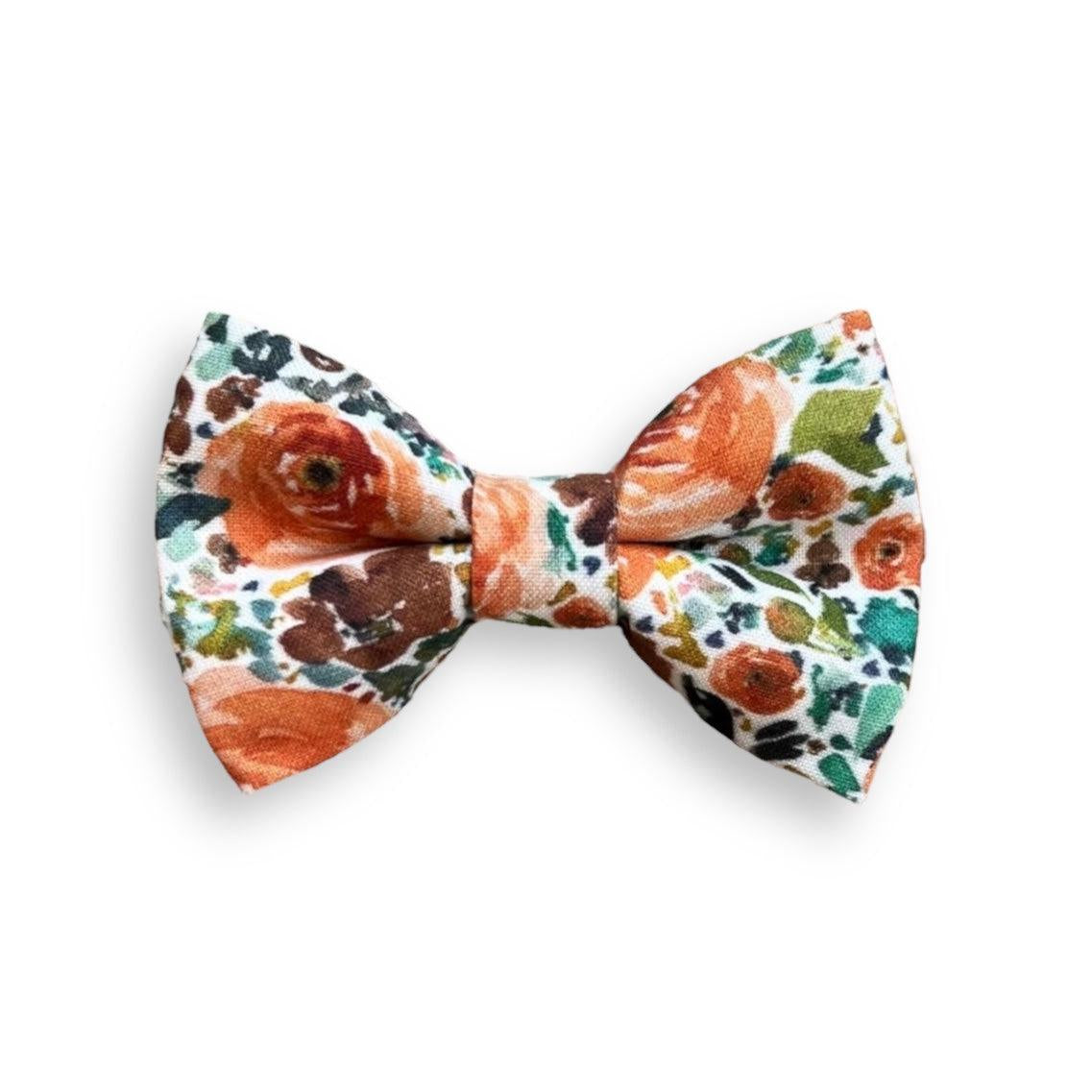 a bow tie with a flower pattern on it