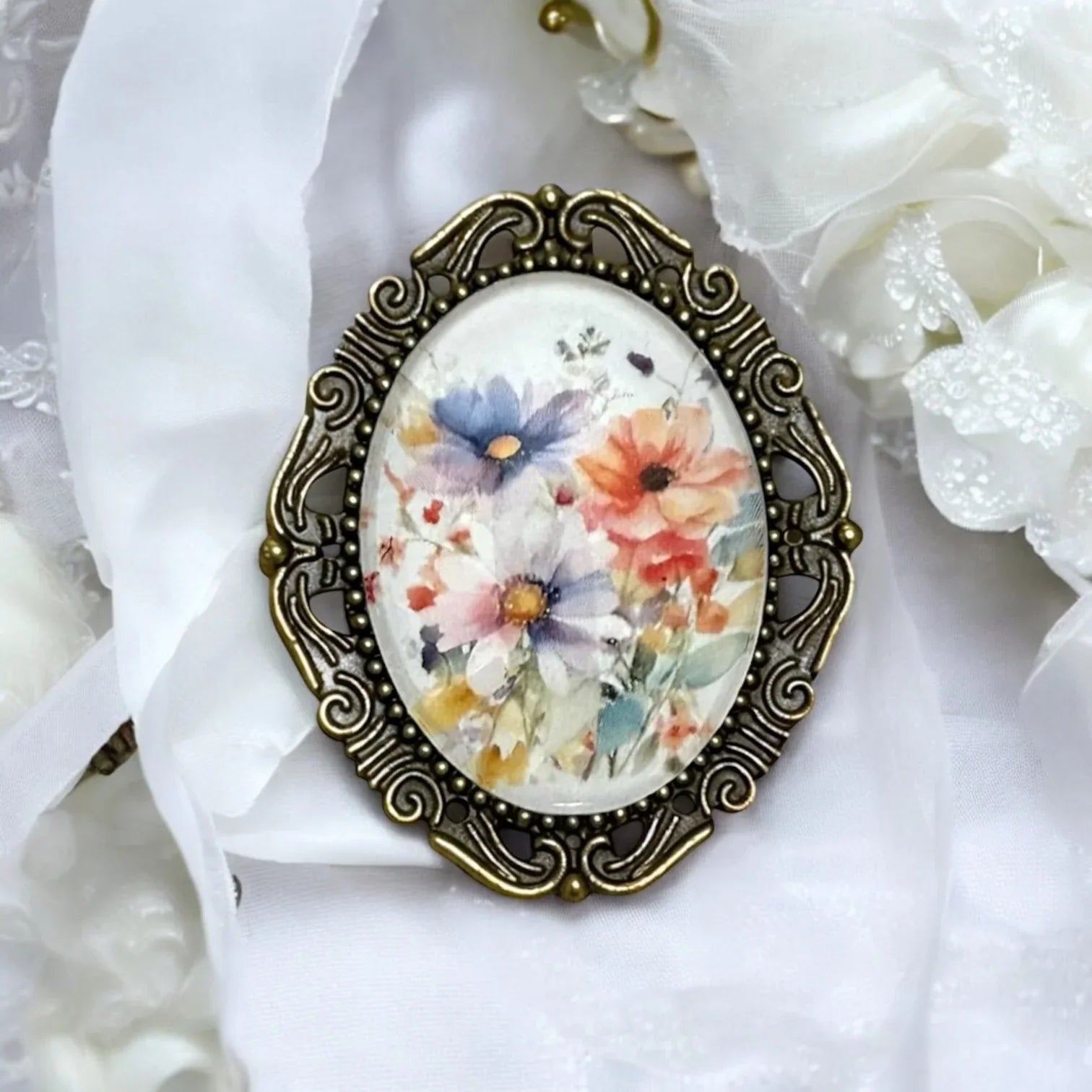 Decorative floral brooch for her, Mother's Day gift, or birthday gift on a white background.