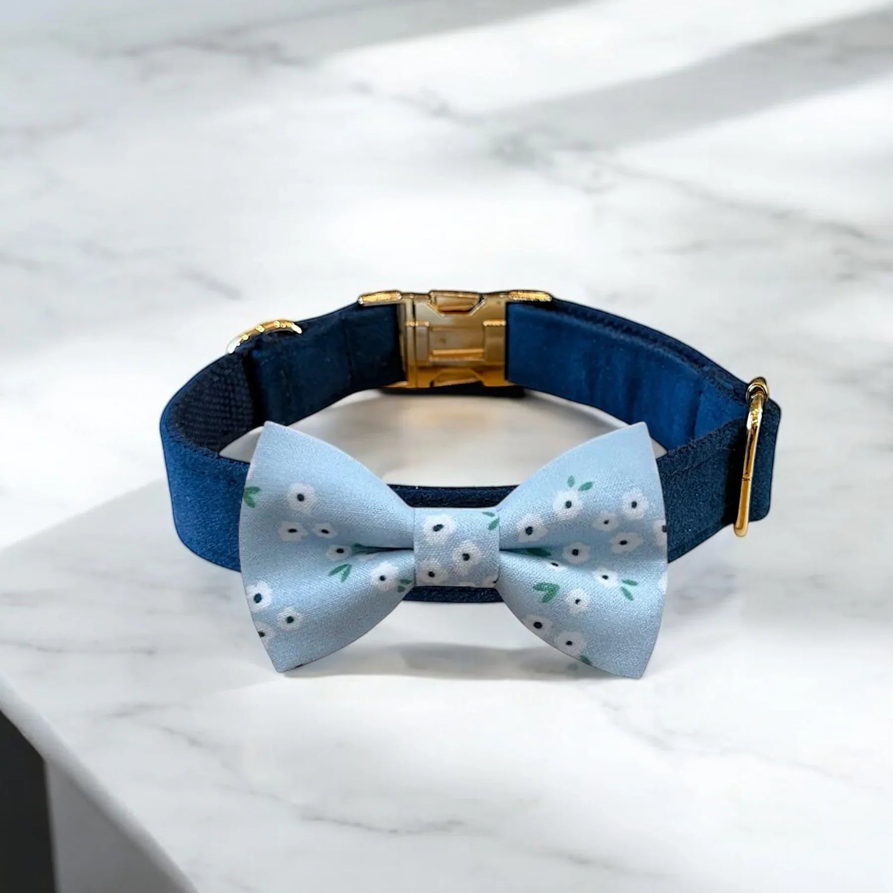 Dog bow tie size chart. Size Small is 3 1/2 inches wide for small dogs under 15 lbs. Size Medium is 4 inches wide for medium dogs between 15 band 40 lbs. Size Large is 4 1/2 inches wide for Large Dogs between 40 band 80 lbs. Size Extra Large is 5 1/2 inches wide for Extra Large Dogs over 80 lbs. Sizing is up to preference and pet bow ties slide on to dog collars with elastic.