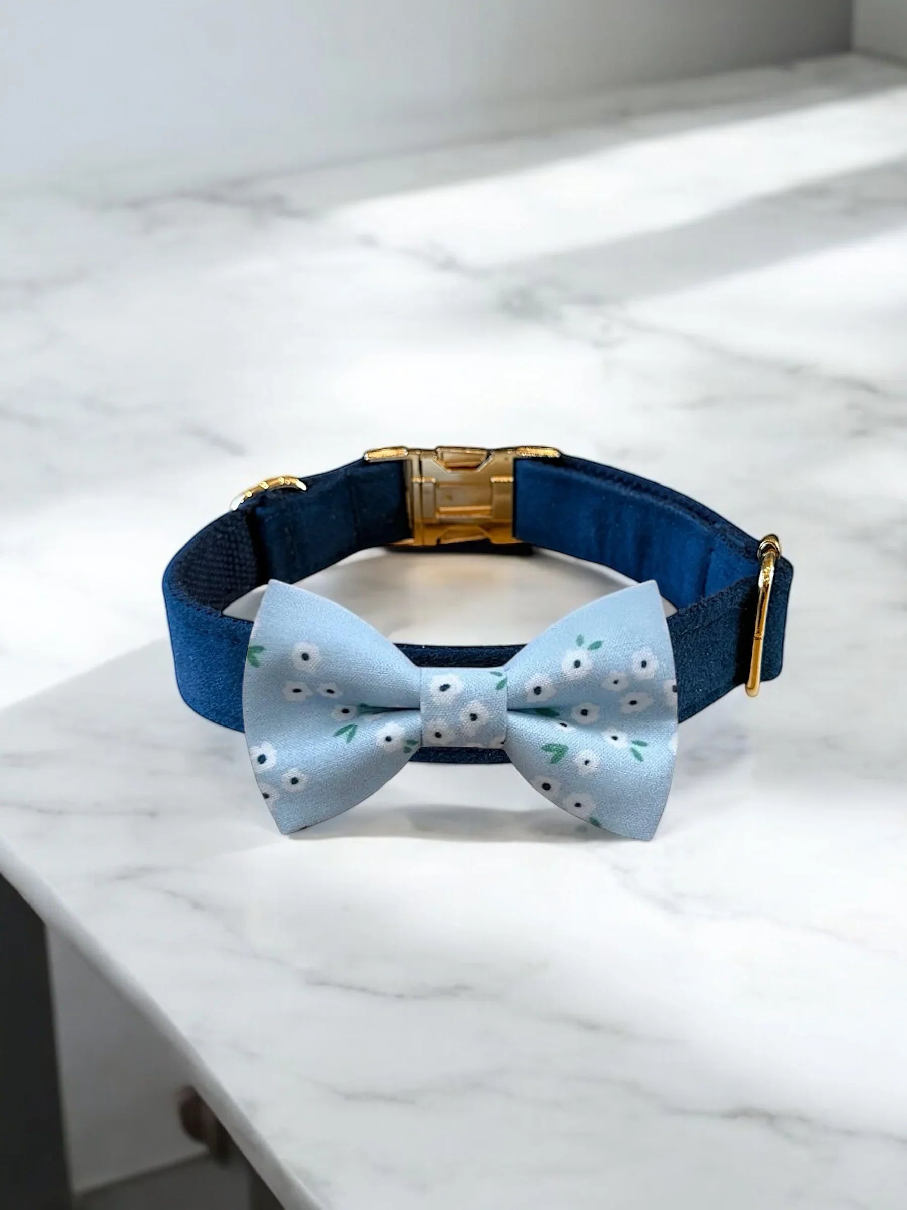 Dog bow tie size chart. Size Small is 3 1/2 inches wide for small dogs under 15 lbs. Size Medium is 4 inches wide for medium dogs between 15 band 40 lbs. Size Large is 4 1/2 inches wide for Large Dogs between 40 band 80 lbs. Size Extra Large is 5 1/2 inches wide for Extra Large Dogs over 80 lbs. Sizing is up to preference and pet bow ties slide on to dog collars with elastic.