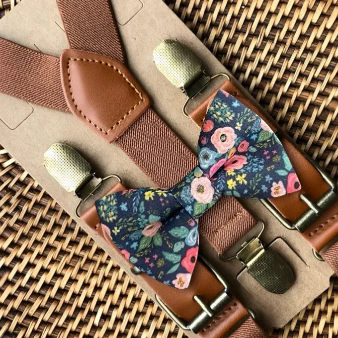 Navy Wonderland Garden bow tie with cognac suspenders displayed together