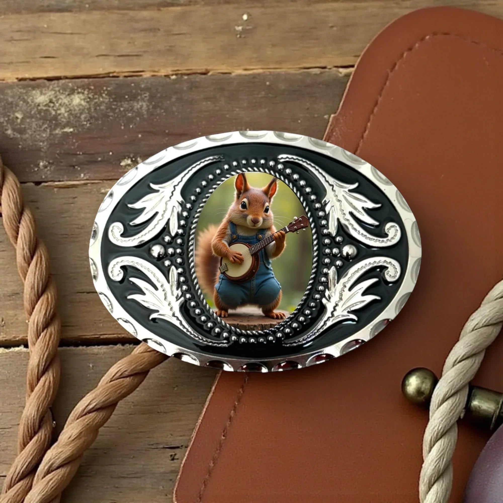Two options for belt buckles: Option 1 has a leaf pattern and option 2 has flowers on it