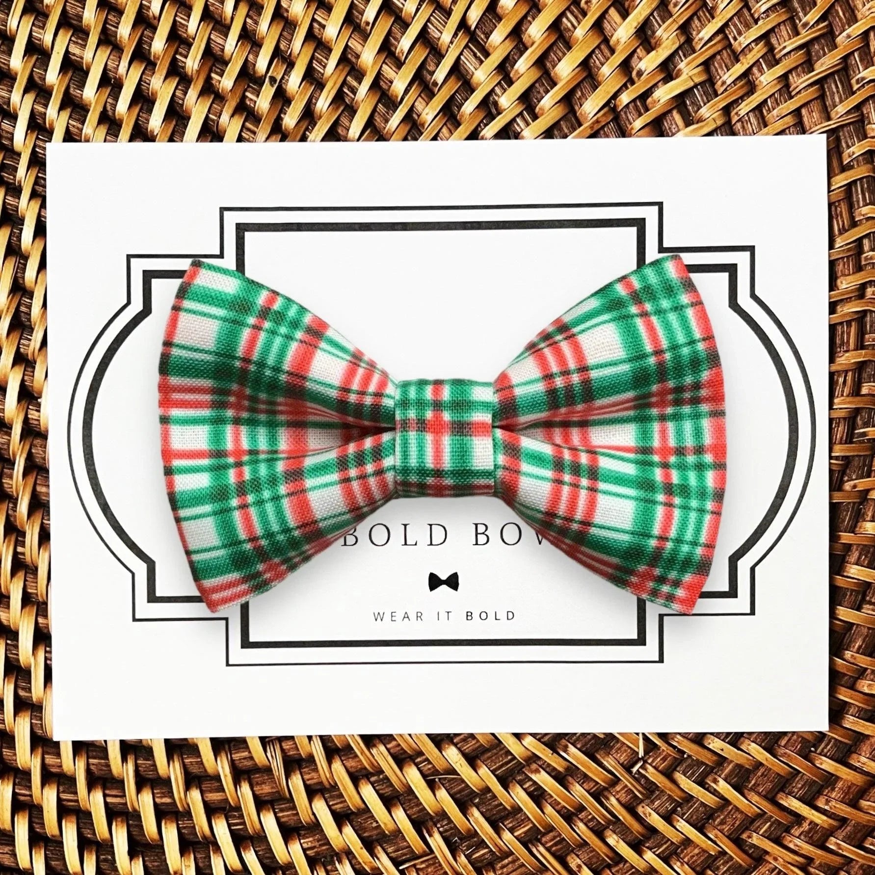 Dog bow tie size chart. Size Small is 3 1/2 inches wide for small dogs under 15 lbs. Size Medium is 4 inches wide for medium dogs between 15 band 40 lbs. Size Large is 4 1/2 inches wide for Large Dogs between 40 band 80 lbs. Size Extra Large is 5 1/2 inches wide for Extra Large Dogs over 80 lbs. Sizing is up to preference and pet bow ties slide on to dog collars with elastic.