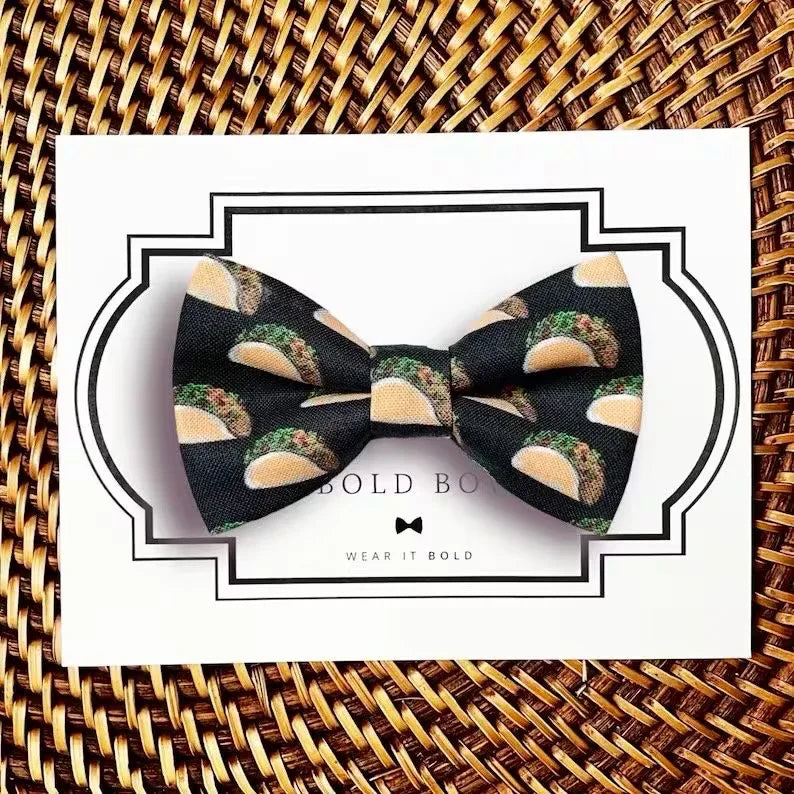 Dog bow tie size chart. Size Small is 3 1/2 inches wide for small dogs under 15 lbs. Size Medium is 4 inches wide for medium dogs between 15 band 40 lbs. Size Large is 4 1/2 inches wide for Large Dogs between 40 band 80 lbs. Size Extra Large is 5 1/2 inches wide for Extra Large Dogs over 80 lbs. Sizing is up to preference and pet bow ties slide on to dog collars with elastic.