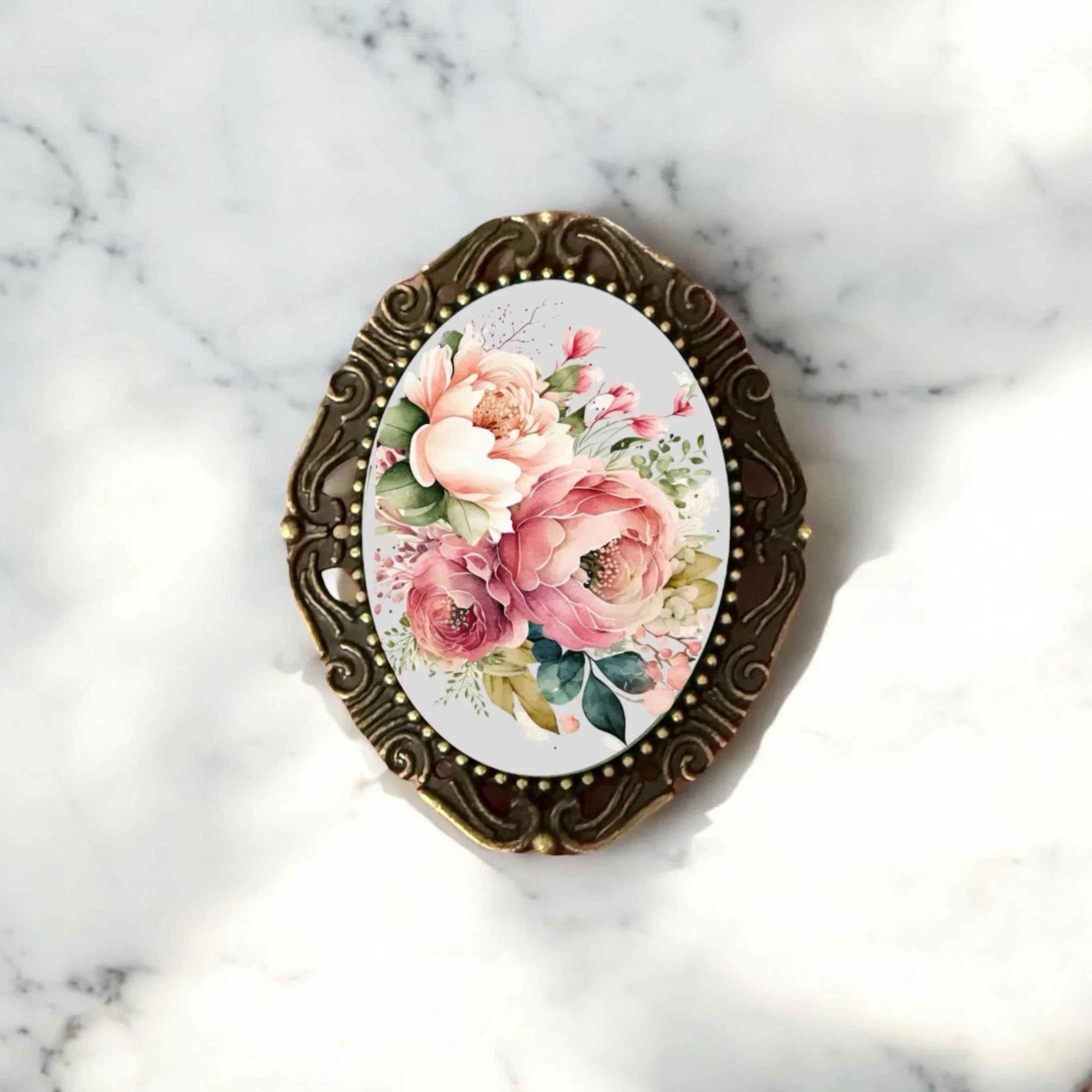 Decorative floral brooch for her, Mother's Day gift, or birthday gift on a white background.