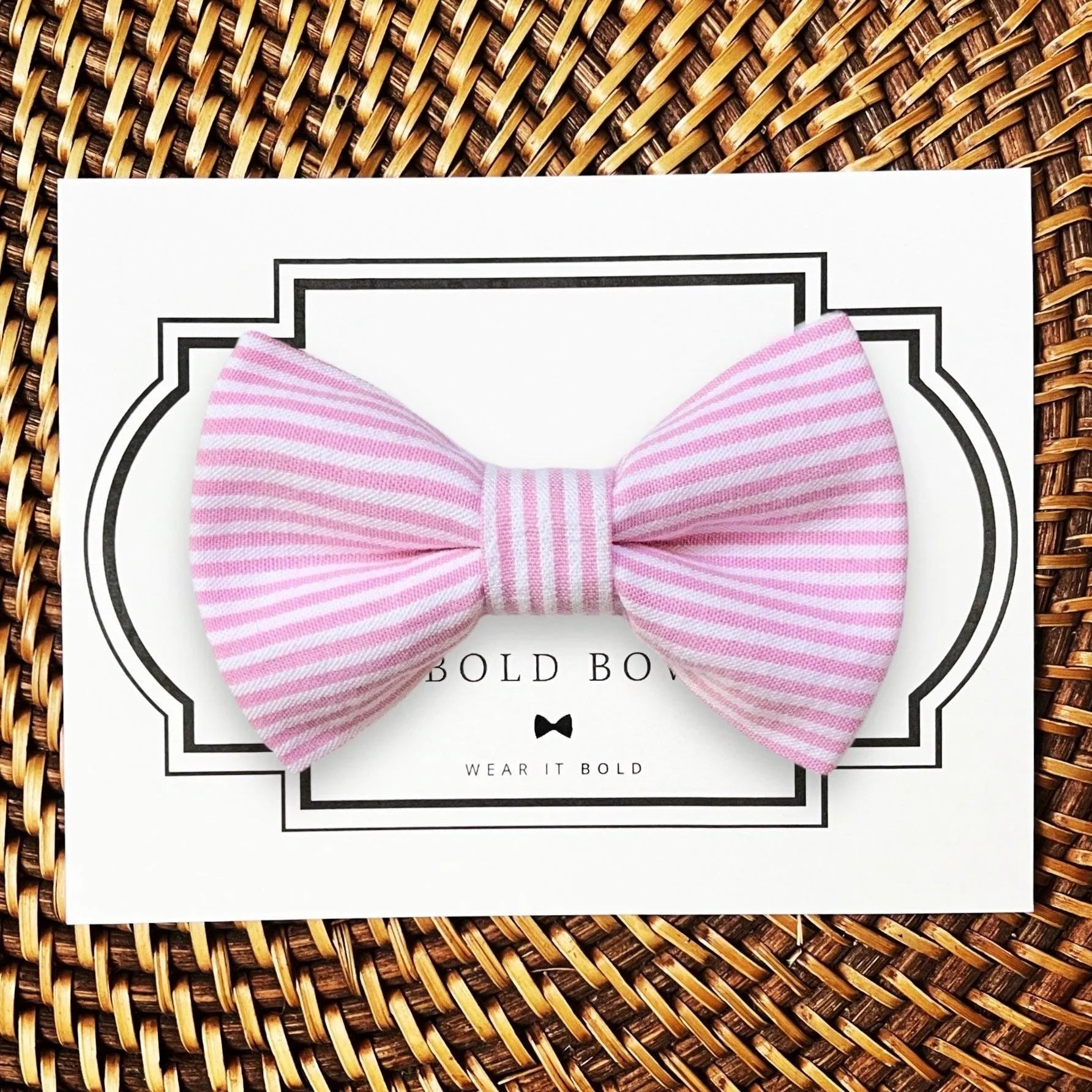 Dog bow tie size chart. Size Small is 3 1/2 inches wide for small dogs under 15 lbs. Size Medium is 4 inches wide for medium dogs between 15 band 40 lbs. Size Large is 4 1/2 inches wide for Large Dogs between 40 band 80 lbs. Size Extra Large is 5 1/2 inches wide for Extra Large Dogs over 80 lbs. Sizing is up to preference and pet bow ties slide on to dog collars with elastic.