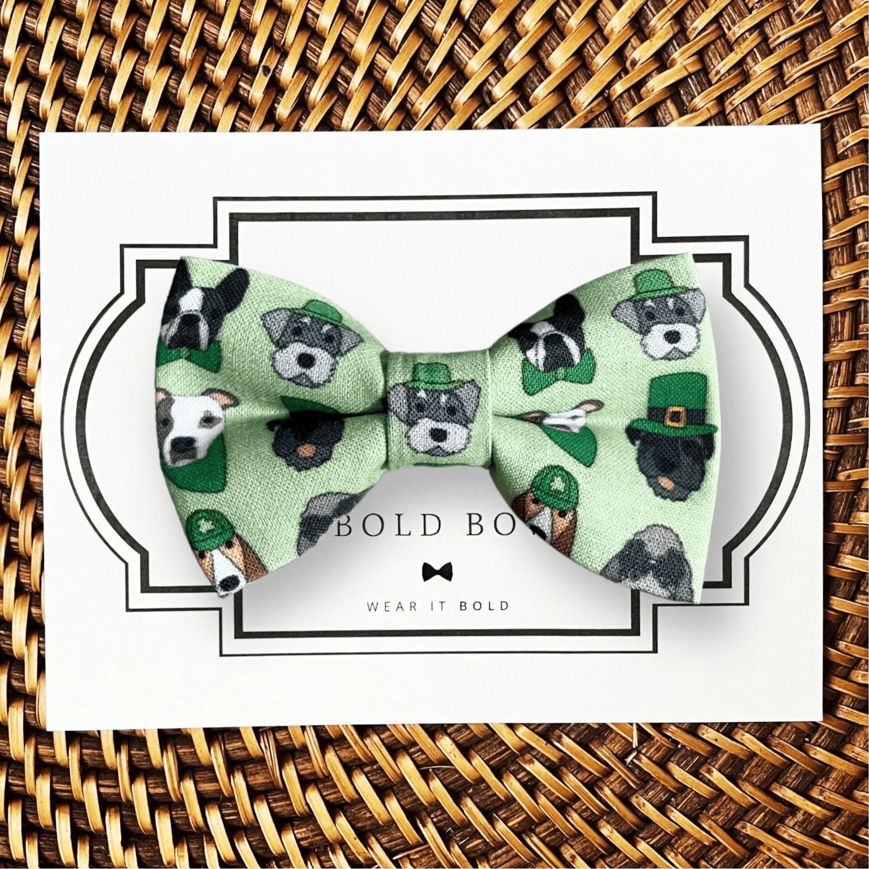Dog bow tie size chart. Size Small is 3 1/2 inches wide for small dogs under 15 lbs. Size Medium is 4 inches wide for medium dogs between 15 band 40 lbs. Size Large is 4 1/2 inches wide for Large Dogs between 40 band 80 lbs. Size Extra Large is 5 1/2 inches wide for Extra Large Dogs over 80 lbs. Sizing is up to preference and pet bow ties slide on to dog collars with elastic.