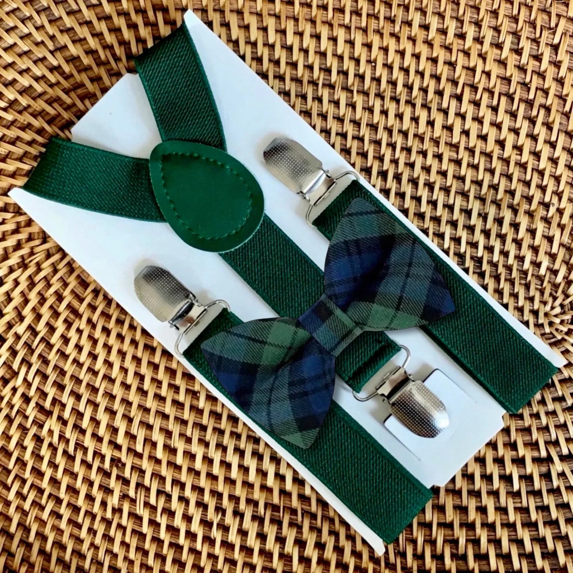 Plaid bow tie in green and navy blue.