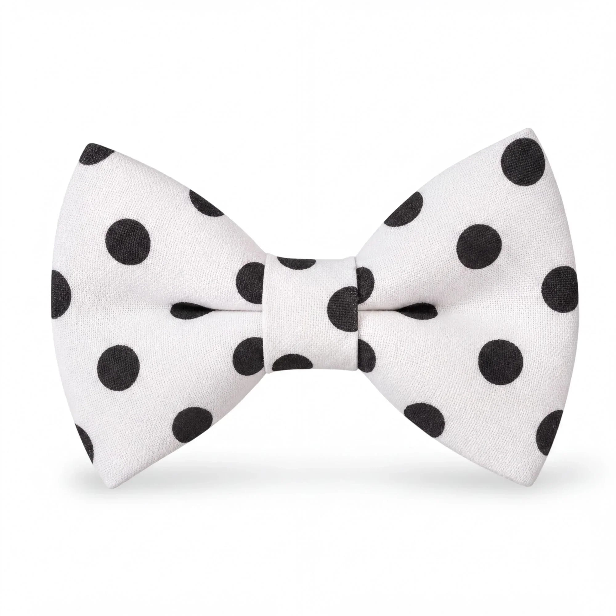Polka dot bowtie for men boys and toddlers in white with black dots.