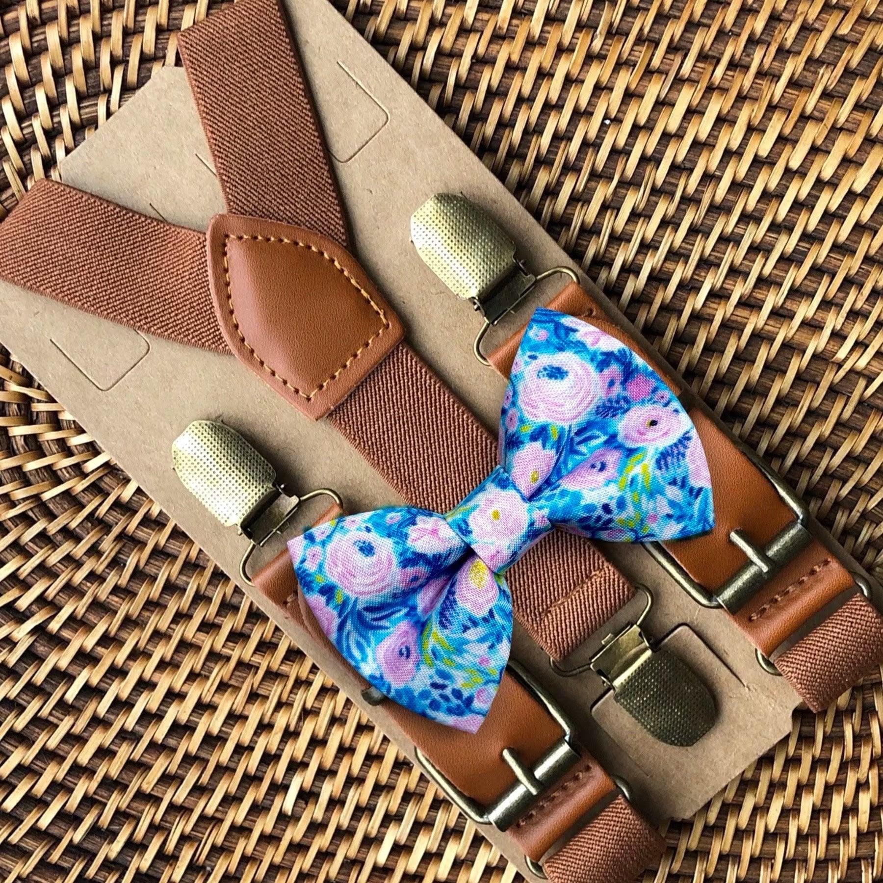 a close up of a bow tie and suspenders