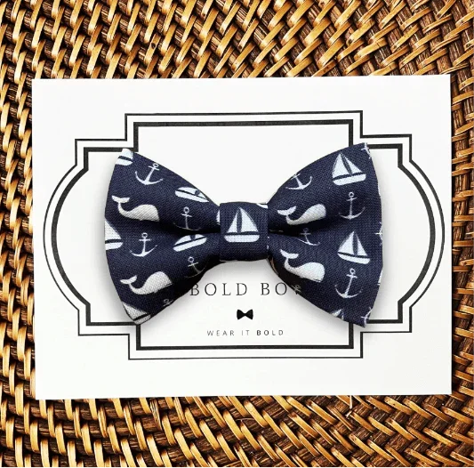 Dog bow tie size chart. Size Small is 3 1/2 inches wide for small dogs under 15 lbs. Size Medium is 4 inches wide for medium dogs between 15 band 40 lbs. Size Large is 4 1/2 inches wide for Large Dogs between 40 band 80 lbs. Size Extra Large is 5 1/2 inches wide for Extra Large Dogs over 80 lbs. Sizing is up to preference and pet bow ties slide on to dog collars with elastic.