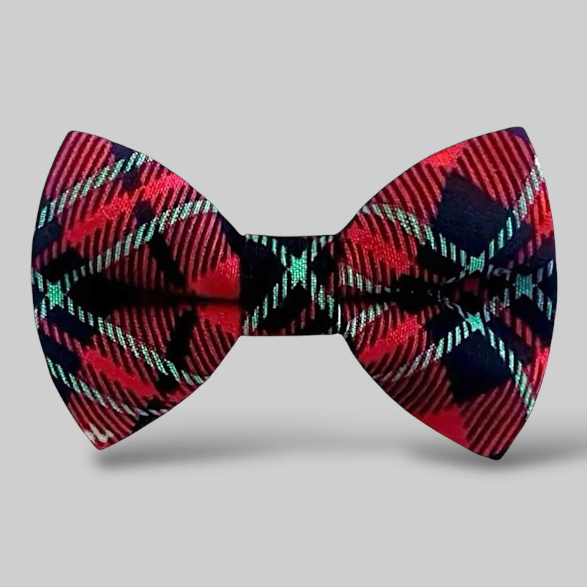Red plaid hair bow clip for women, weddings and Christmas on a white background