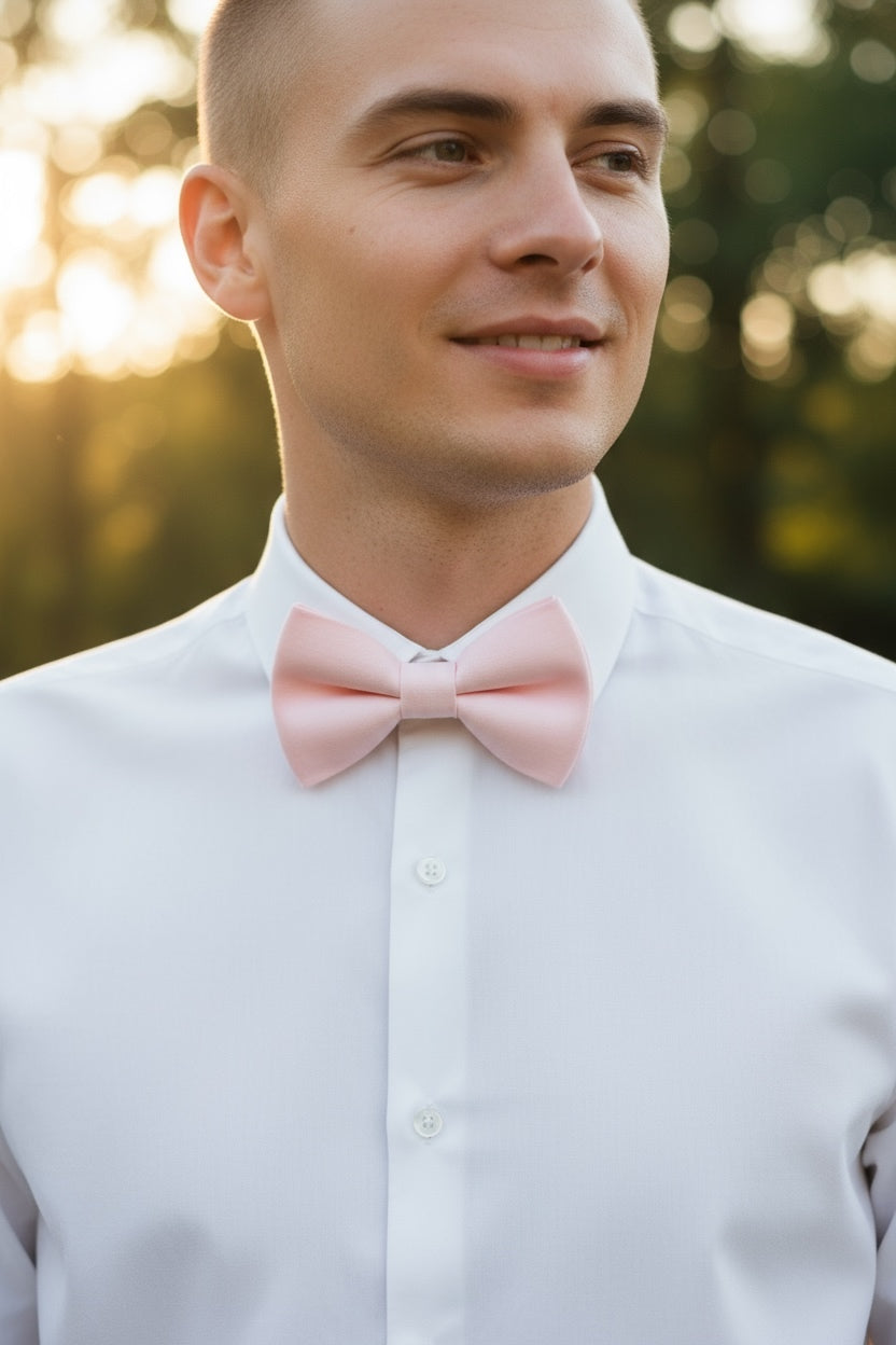Blush Bow Tie being worn by a groomsman in a wedding.