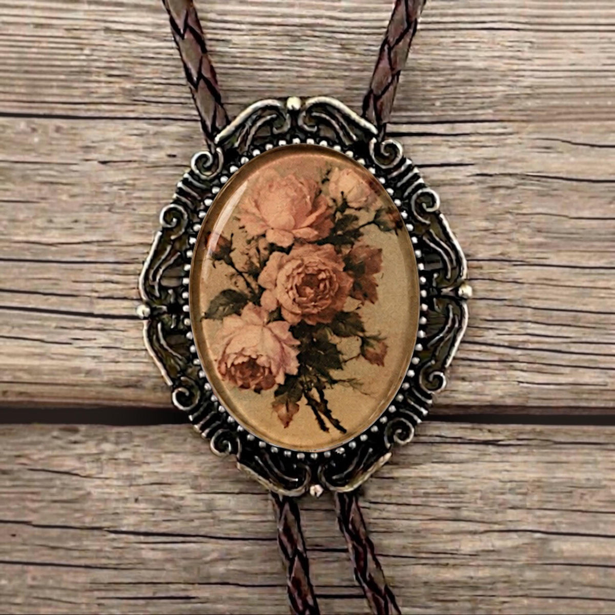 Dusty pink flowers glass cabochon groomsmen gift western jewelry dark braided string metal tips.