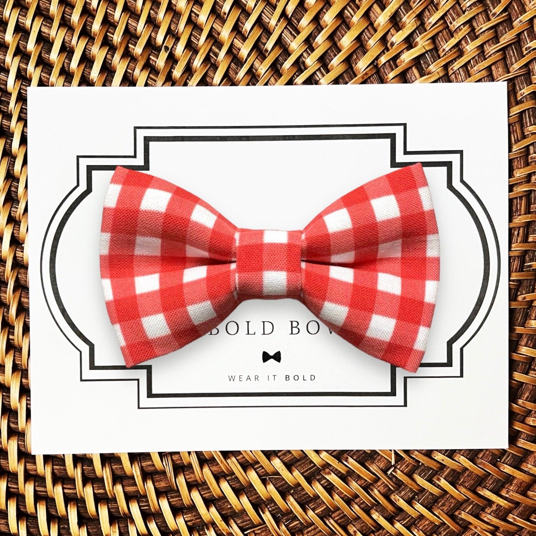 Dog bow tie size chart. Size Small is 3 1/2 inches wide for small dogs under 15 lbs. Size Medium is 4 inches wide for medium dogs between 15 band 40 lbs. Size Large is 4 1/2 inches wide for Large Dogs between 40 band 80 lbs. Size Extra Large is 5 1/2 inches wide for Extra Large Dogs over 80 lbs. Sizing is up to preference and pet bow ties slide on to dog collars with elastic.