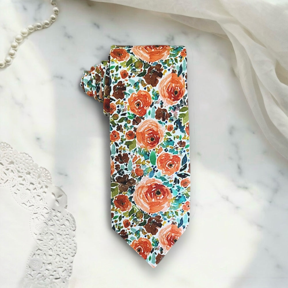 Burnt orange floral men’s tie for wedding.