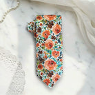 Burnt orange floral men’s tie for wedding.