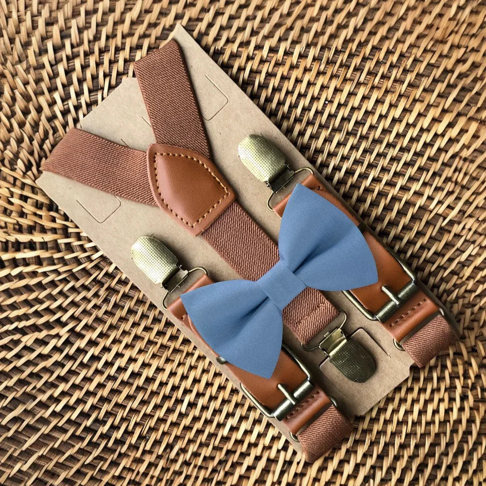 Size chart for suspender and bow tie sets from The Bold Bow Tie. X-Small (6mo-4yr): 15"-23" suspenders, 3.5" bow. Small (5-9yr): 18"-33" suspenders, 3.5" bow. Medium (10-12yr): 18"-33" suspenders, 4" bow. Adult (13yr-6'5"): 30"-53" suspenders, 4.5" bow. Big & Tall (Over 6'5"): 53"+ suspenders, 4.5" bow. Instructions note to measure from the back waistband over the shoulder to the front waistband for a comfortable fit.