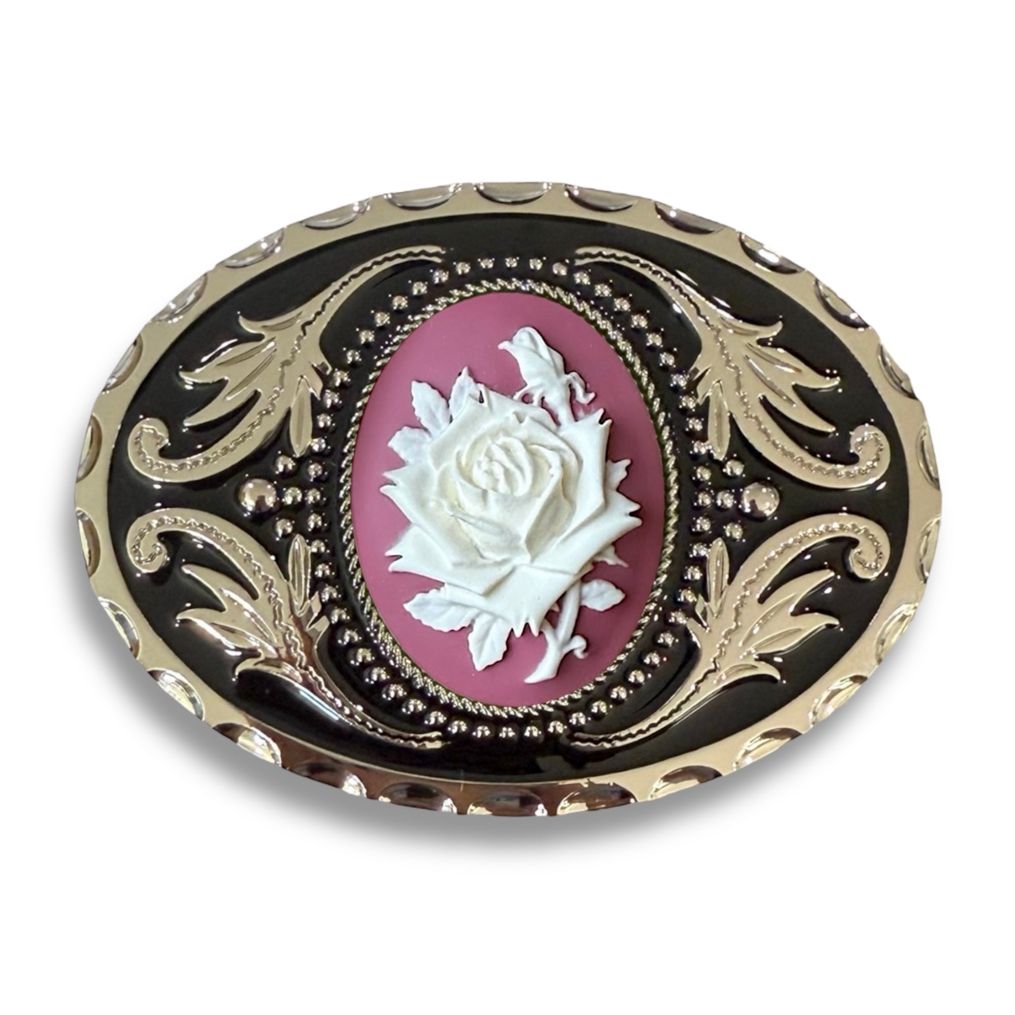 Decorative floral belt buckle with a white rose on a pink background, silver accents, and black border.